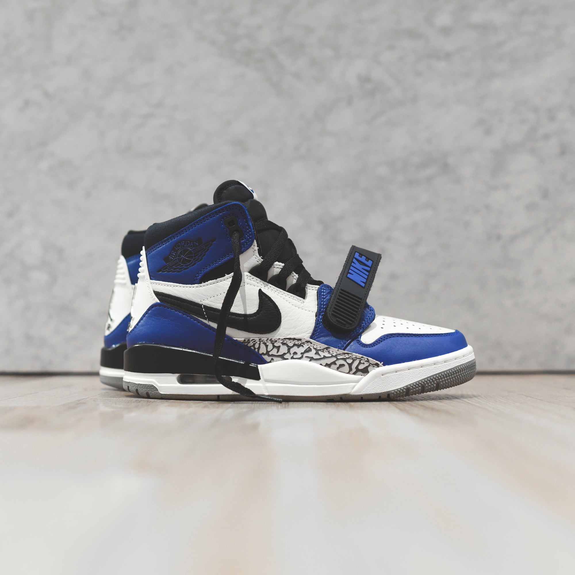 Nike Air Jordan Legacy 312 - Sail / Black / Storm Blue – Kith