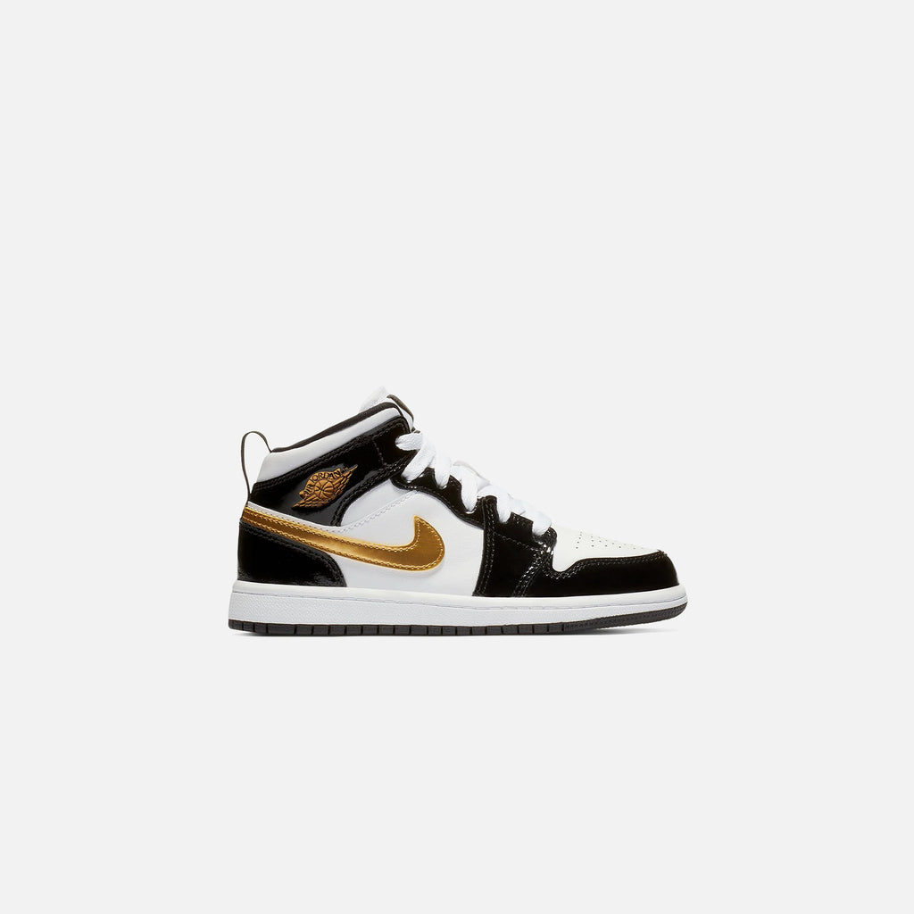 Boys black and gold jordans hotsell