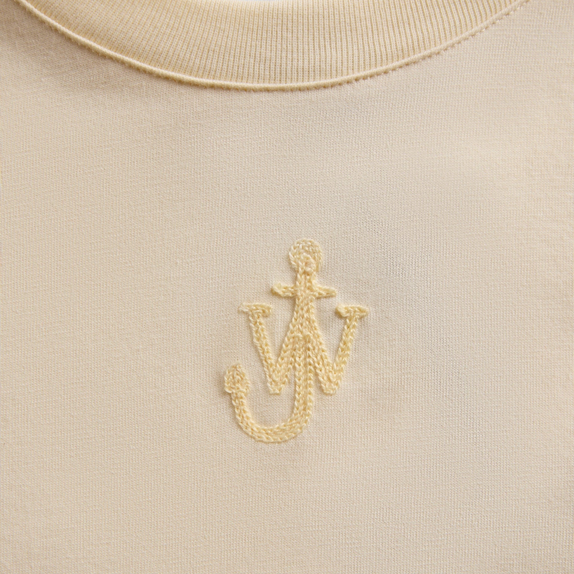 JW Anderson Anchor Embroidery Panelled Cropped Tee in Buttermilk