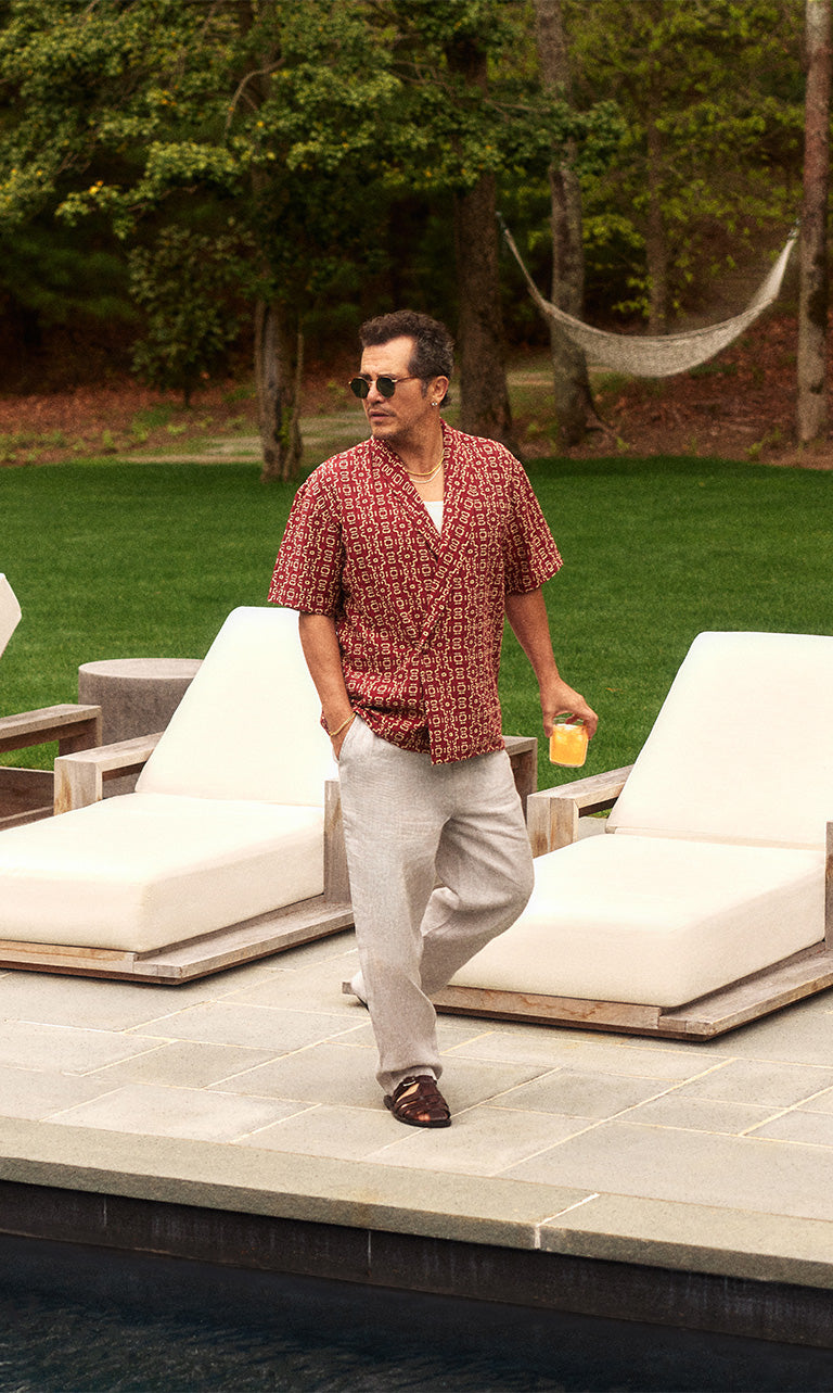 
        John Leguizamo wearing clothes for men from the Kith Summer 2024 campaign.
      
