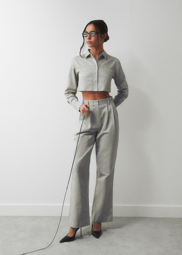 
            A matching shirt and pant set from Kith Women Spring 2024.
          
