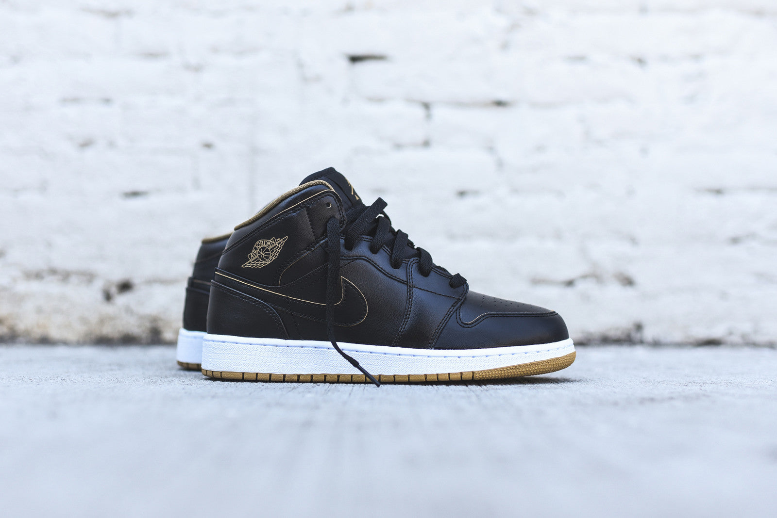 Nike Air Jordan 1 Mid GS - Black / Metallic Gold