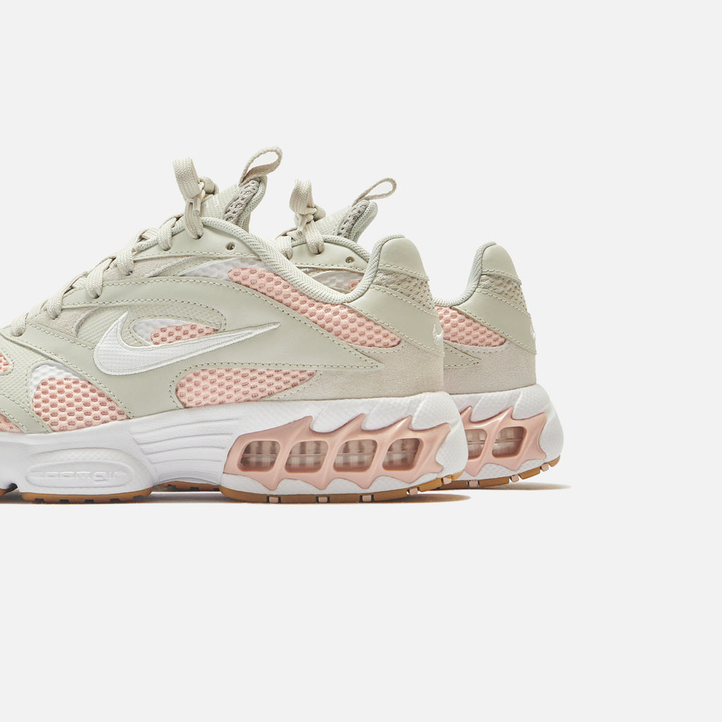 nike air zoom fire sneakers in light bone pale coral