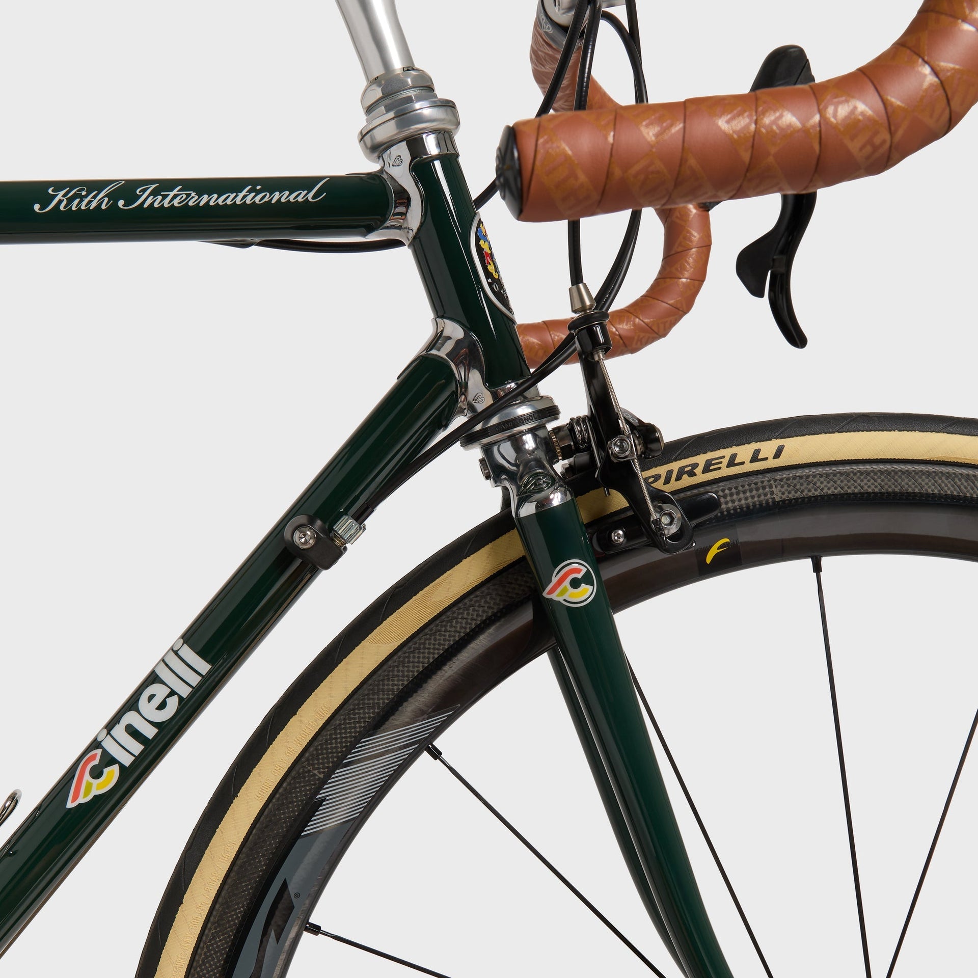 Kith for Cinelli Supercorsa Stadium bike, close-up of the green head tube junction with Kith International script and front brake