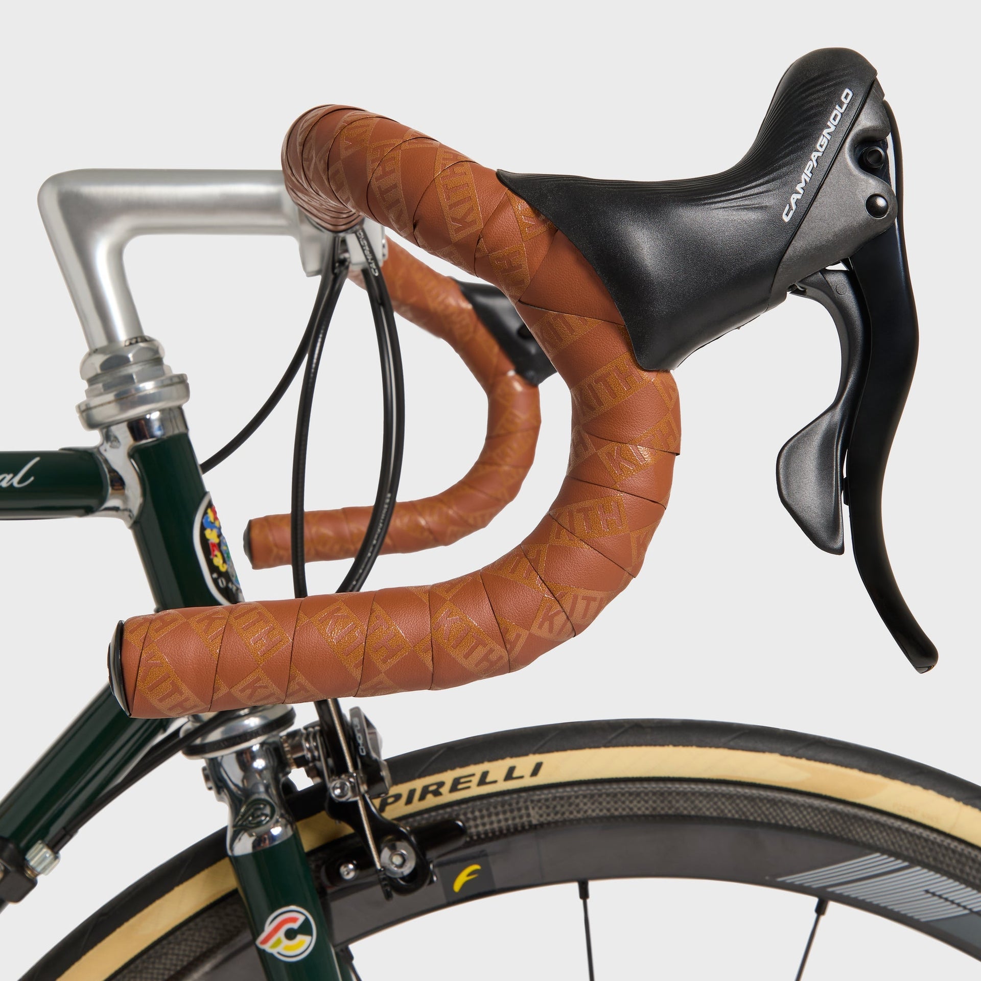 Kith for Cinelli Supercorsa Stadium bike, drop bar detail with Campagnolo brake lever and Kith-logo brown leather bar tape