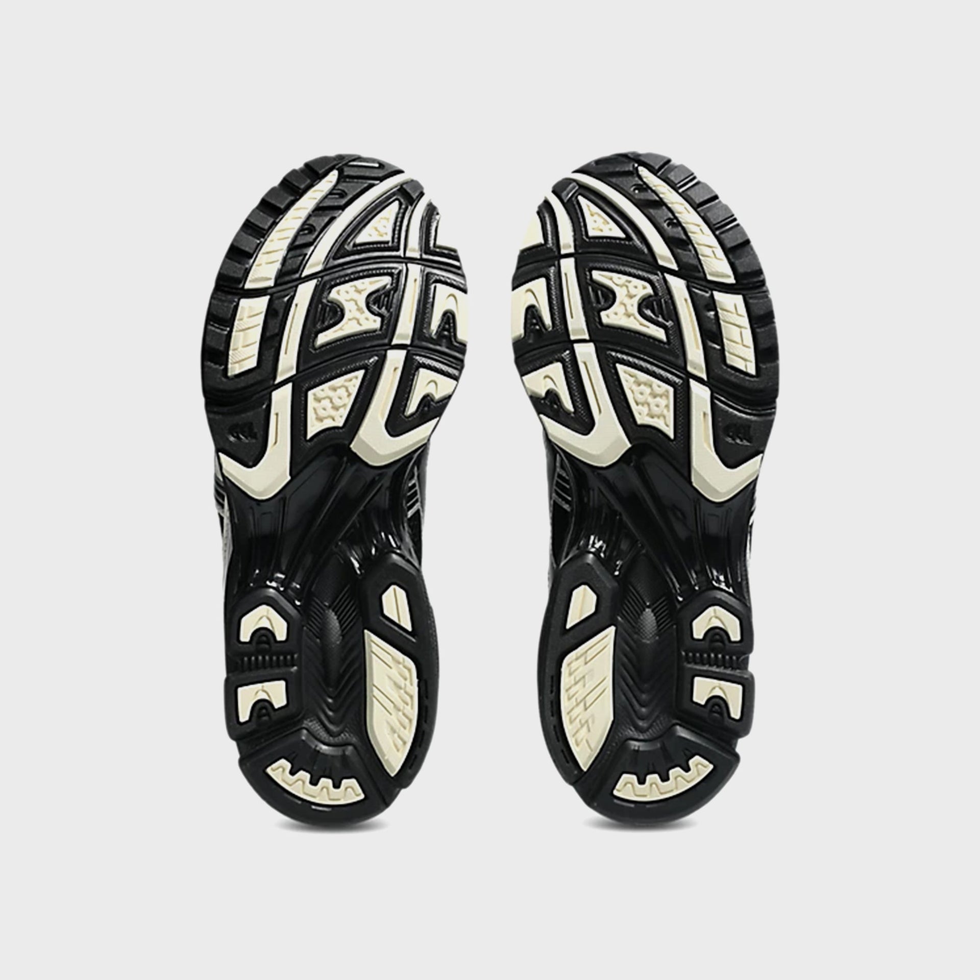 ASICS GEL-KAYANO 14 in Black and Cream, bottom outsole view with cream tread
