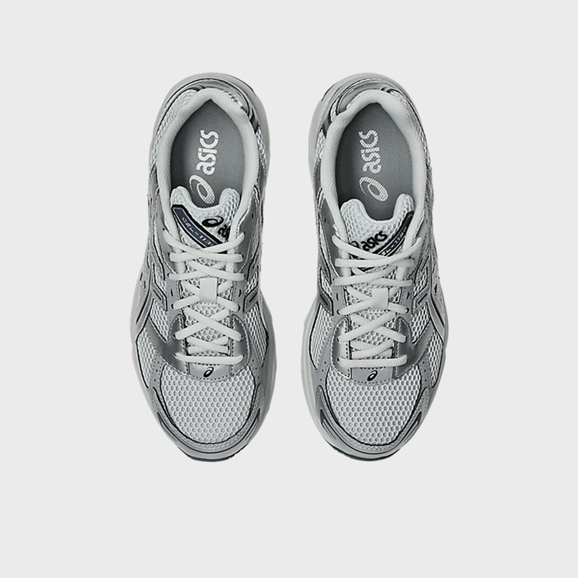 ASICS GEL-1130 in Glacier Grey, top-down view of pair showing grey mesh and asics insole branding