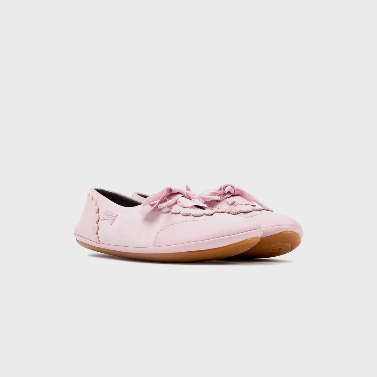 Camper Kids pink suede Mary Jane flats, angled pair view showing scalloped edges and ribbon bow ties