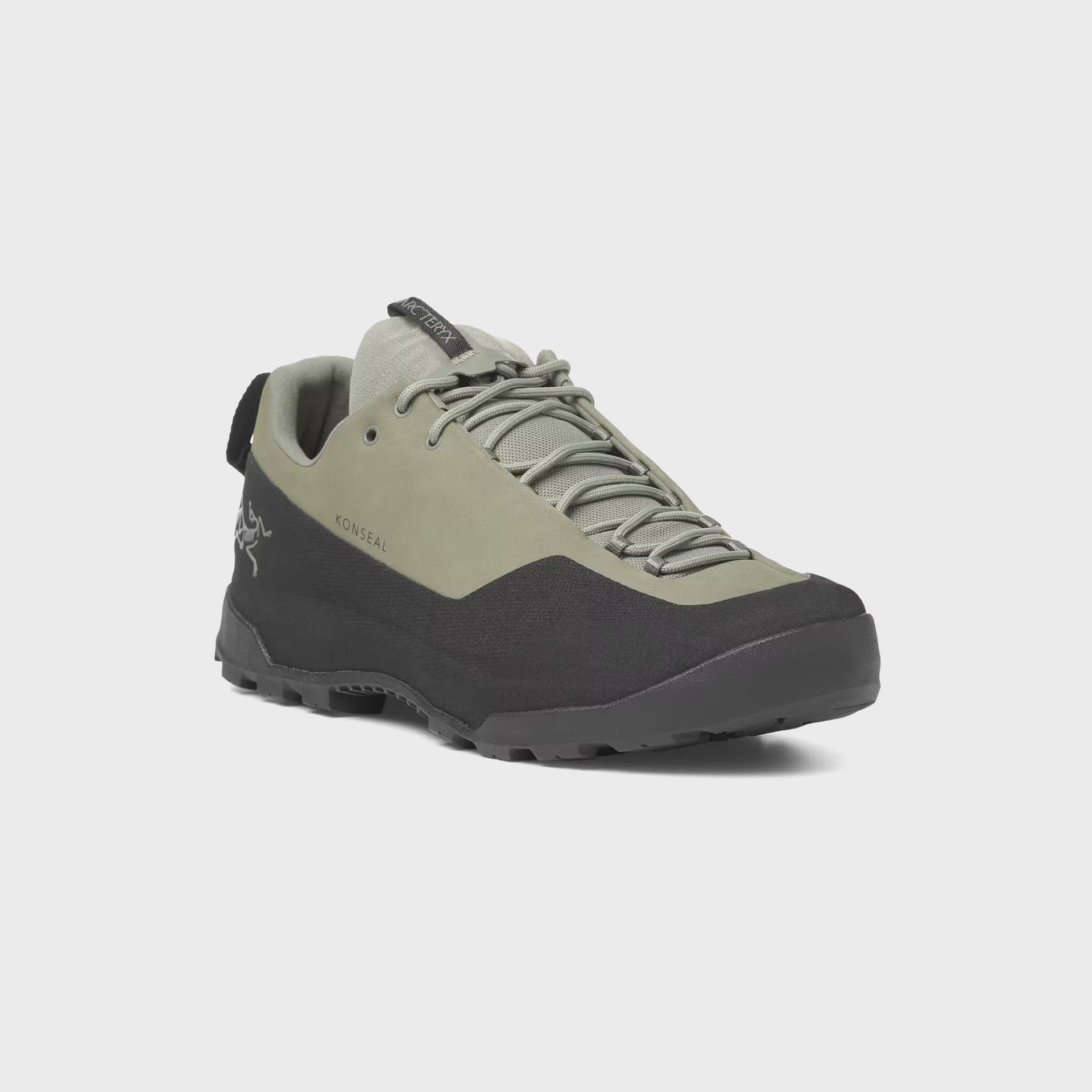 Arc'teryx Konseal approach shoe in forage green with black toe rand, front three-quarter view