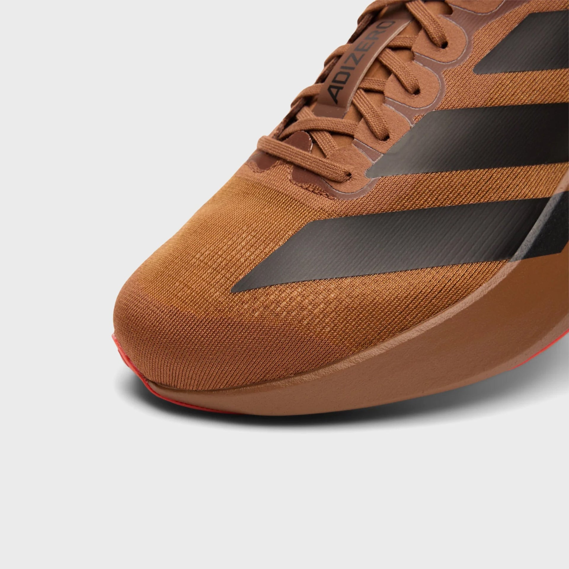adidas x Pharrell Williams Adizero Evo SL - Brown / Craft Chili