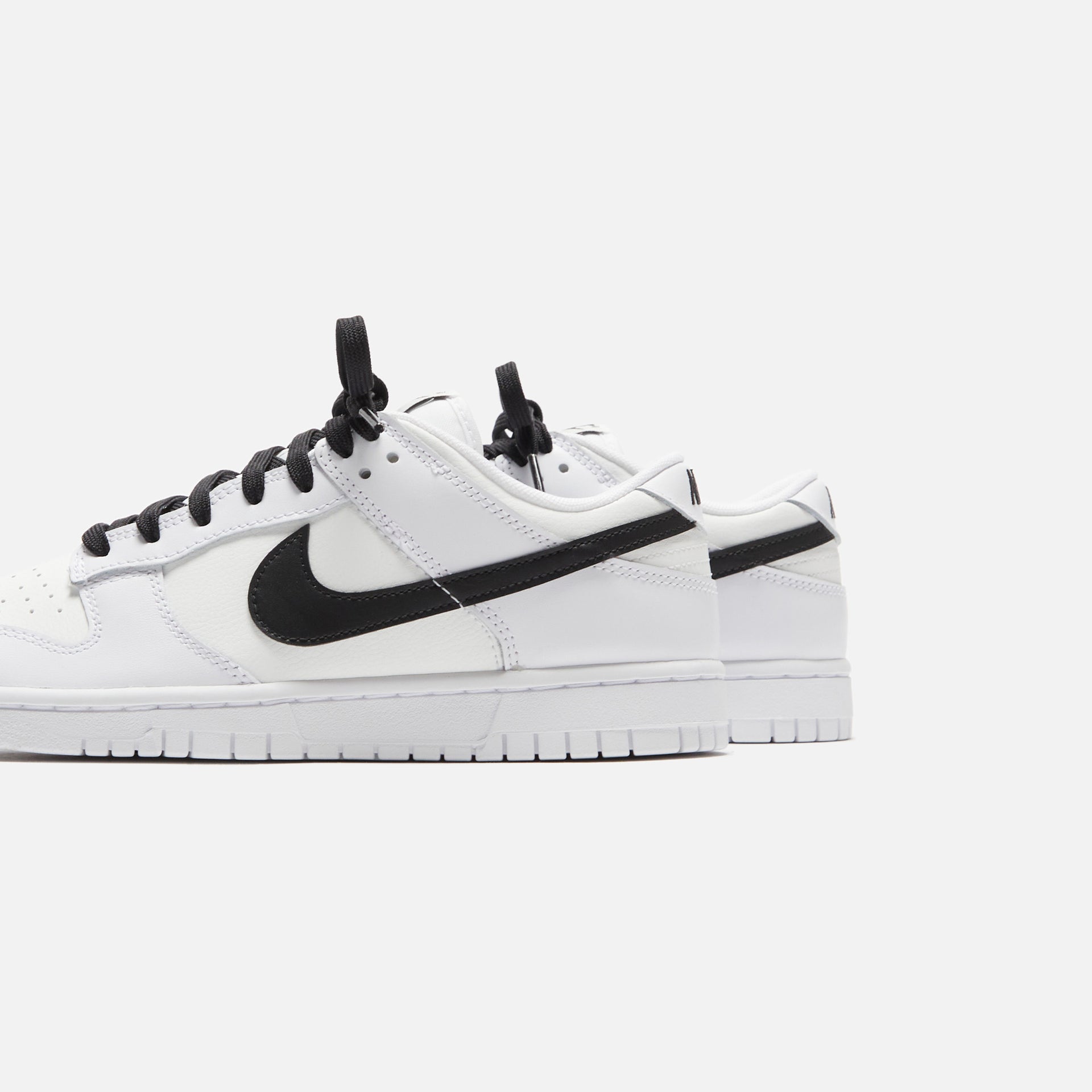 Nike Dunk Low Retro - White / Black / Summit White