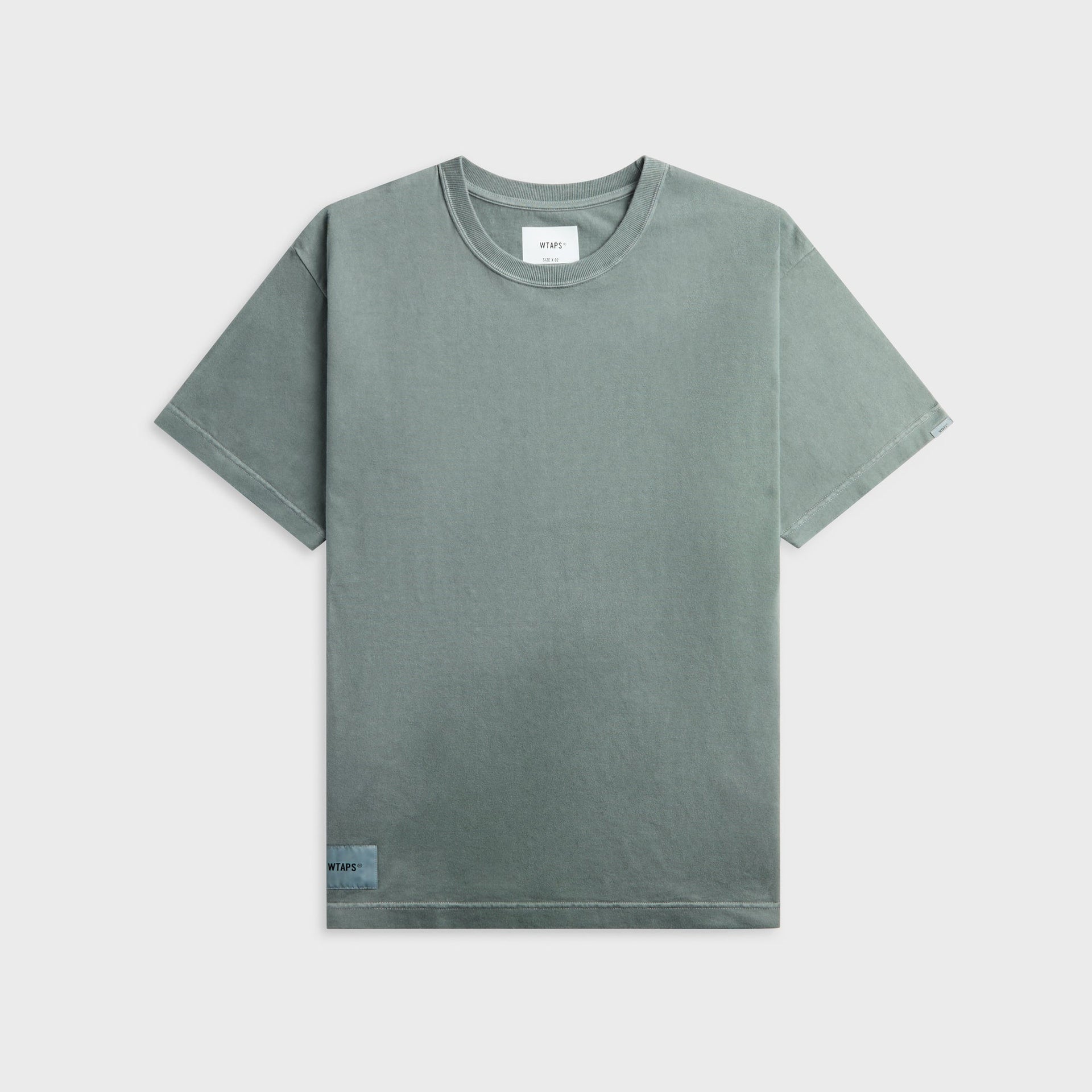 WTAPS Sign-OD short sleeve cotton tee in faded sage grey with small chest logo label, front view, flat lay