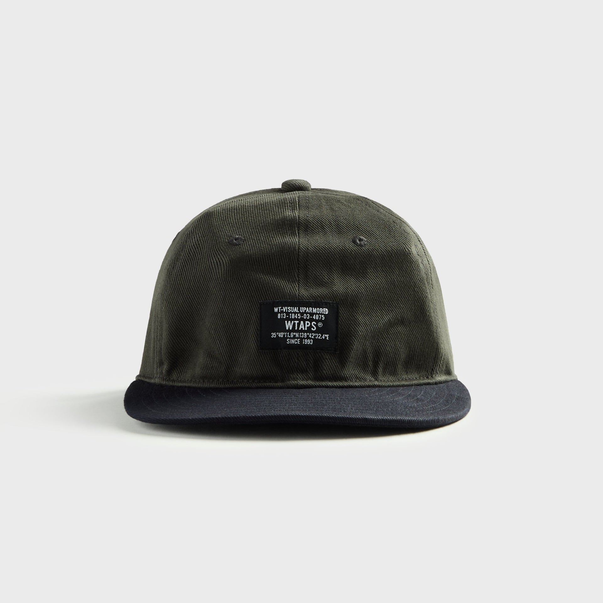 WTAPS T-6M 04 cotton twill cap in charcoal with navy brim and 'WT-Visual Uparmored' woven patch, front view