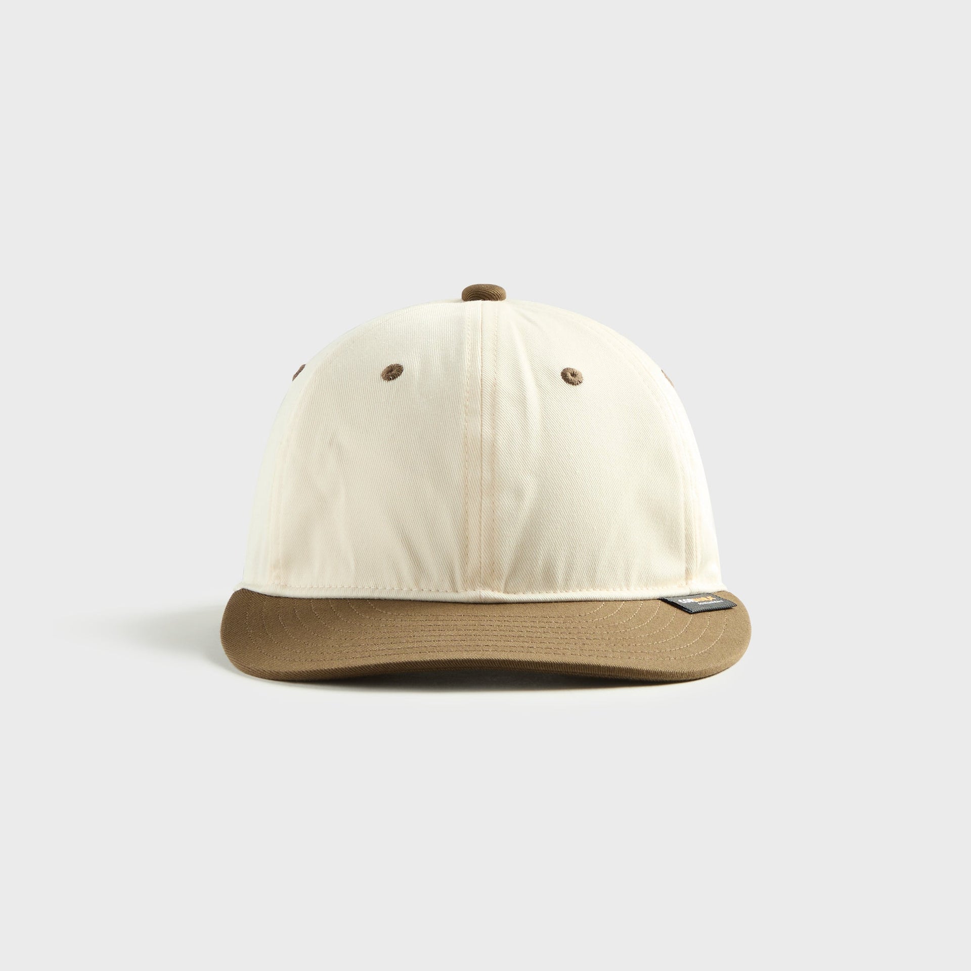 WTAPS T-6M 05 nyco twill Cordura cap in cream with brown brim, front view