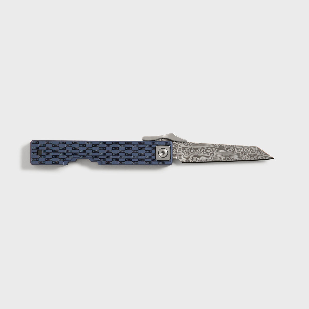 Kith x Benchmade Yamori Nocturnal knife open from the reverse side, Damascus blade extended beside the navy KITH-embossed scale