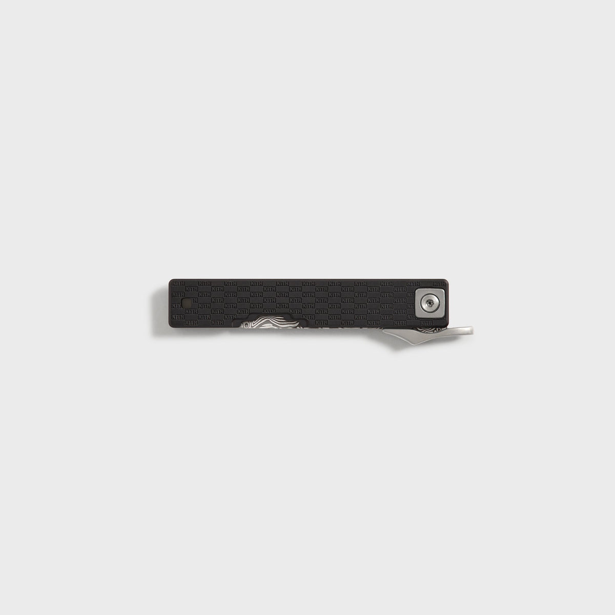 Kith x Benchmade Yamori Black knife closed on the reverse side, pivot screw and thin Damascus blade edge along black handle