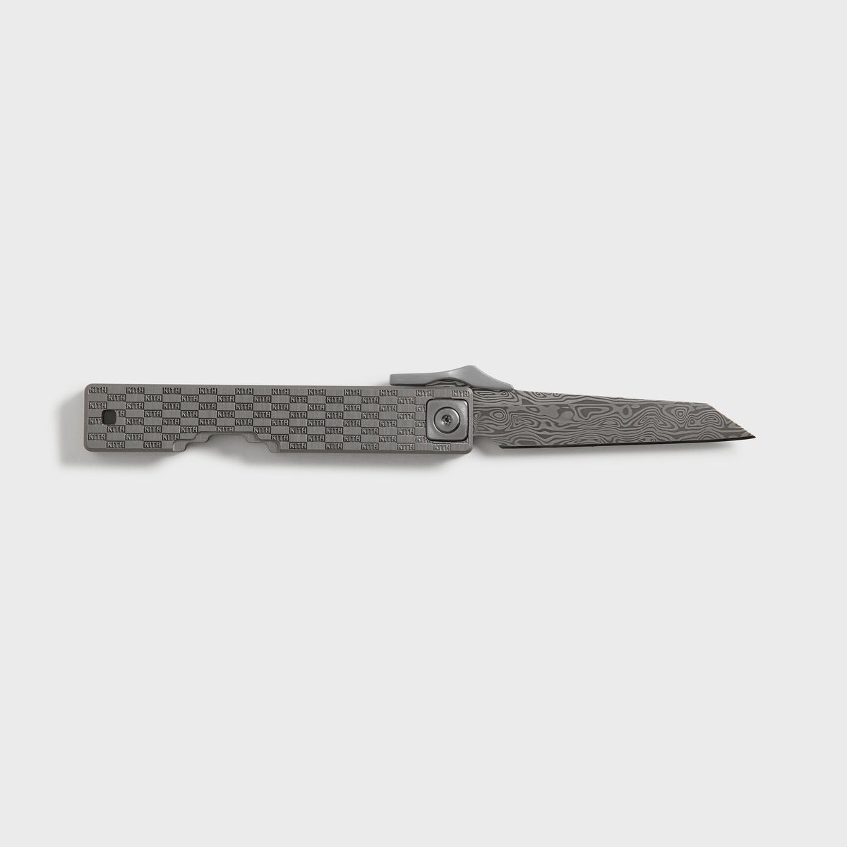Kith x Benchmade Yamori Drift knife open from the reverse side, Damascus blade extended beside the grey KITH-embossed scale
