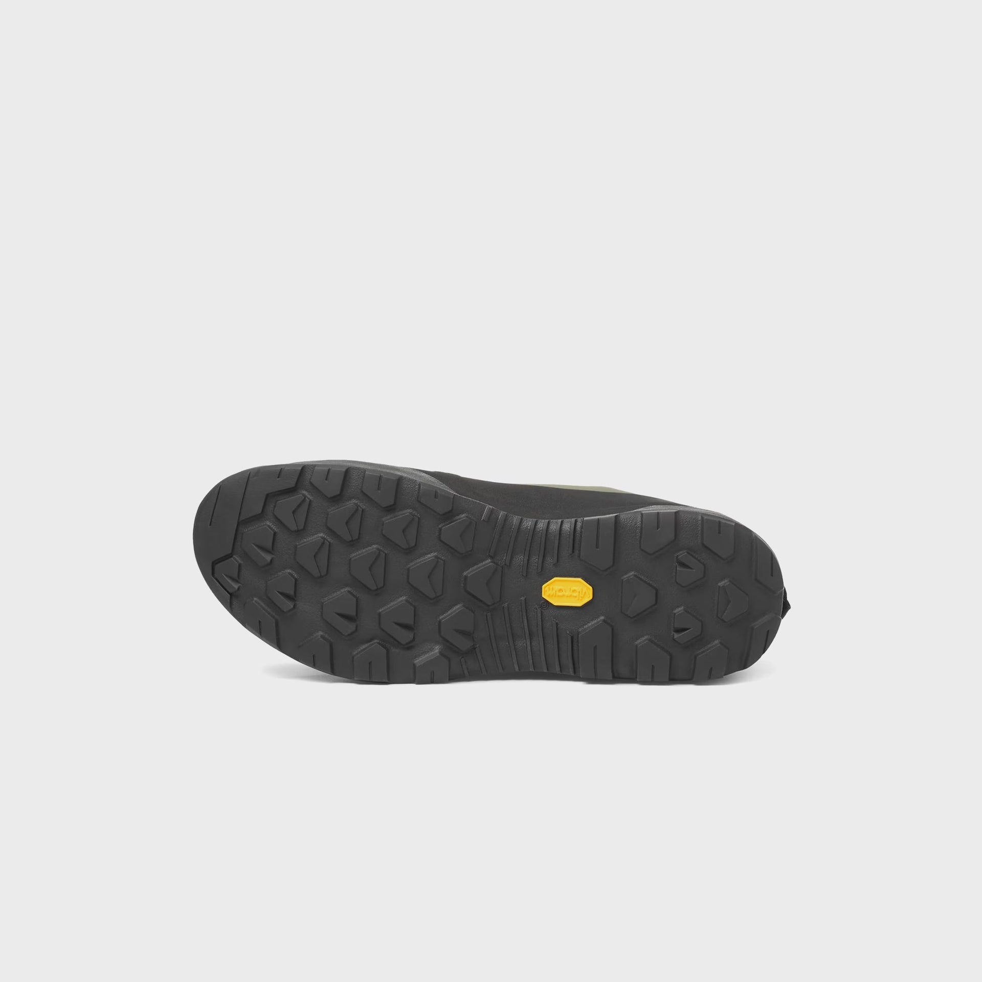 Arc'teryx Konseal approach shoe outsole showing black Vibram hexagonal lug tread pattern