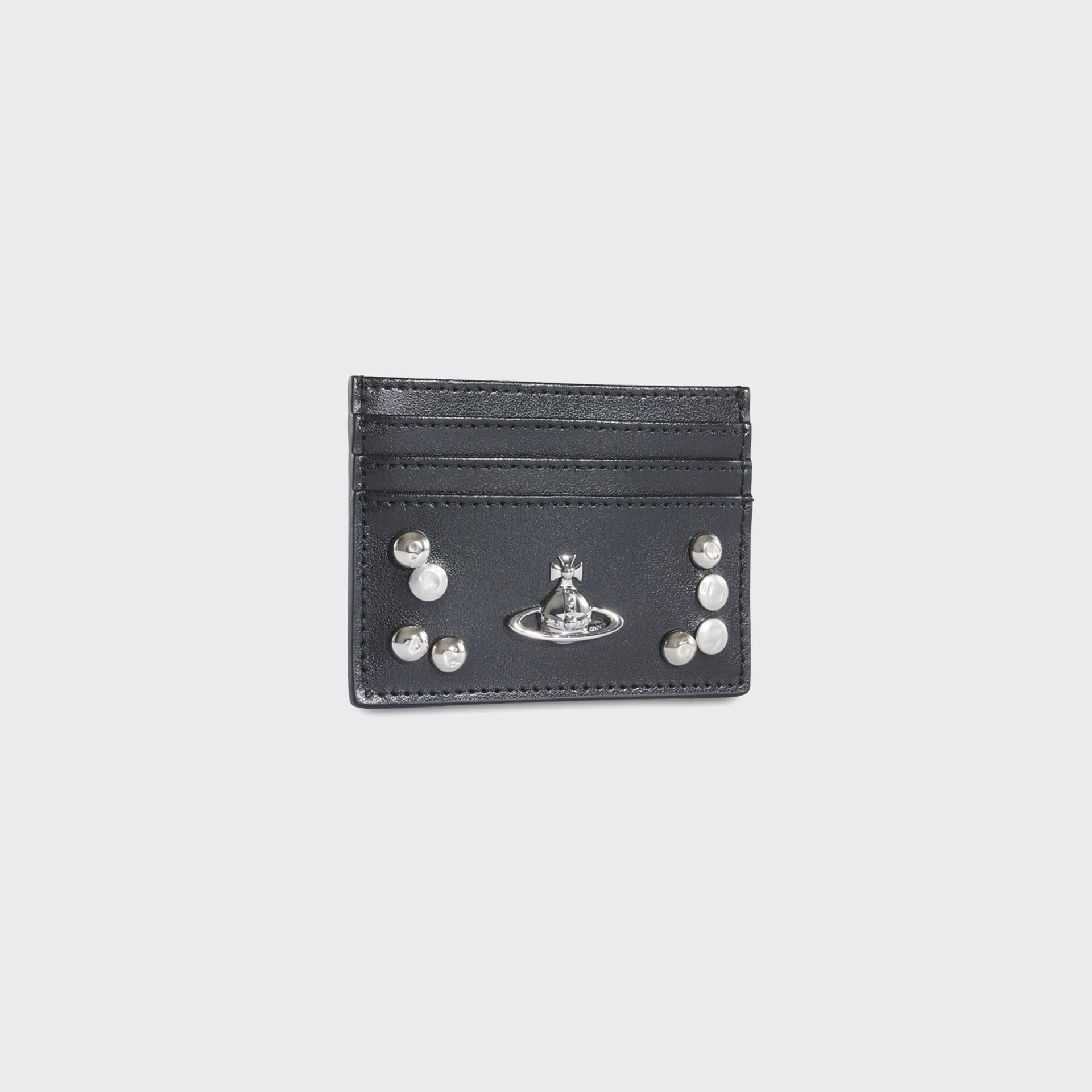 Vivienne Westwood black leather card holder, angled three-quarter view showing card slots, silver Orb and studs