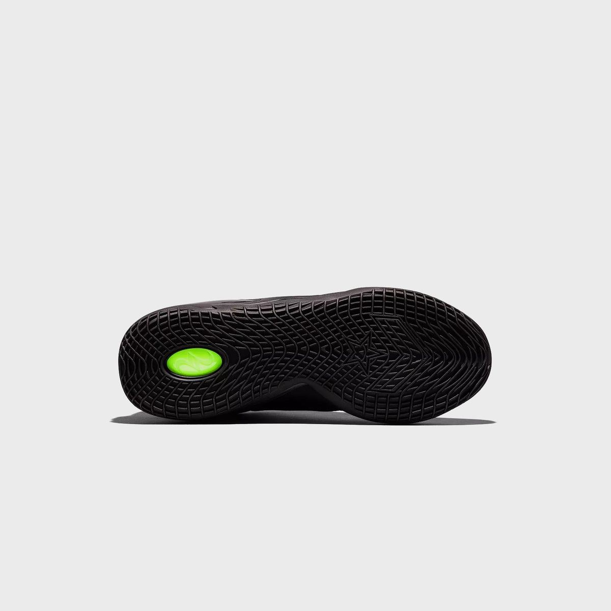 Converse SHAI 001 Ox black rubber outsole with herringbone traction and green heel accent