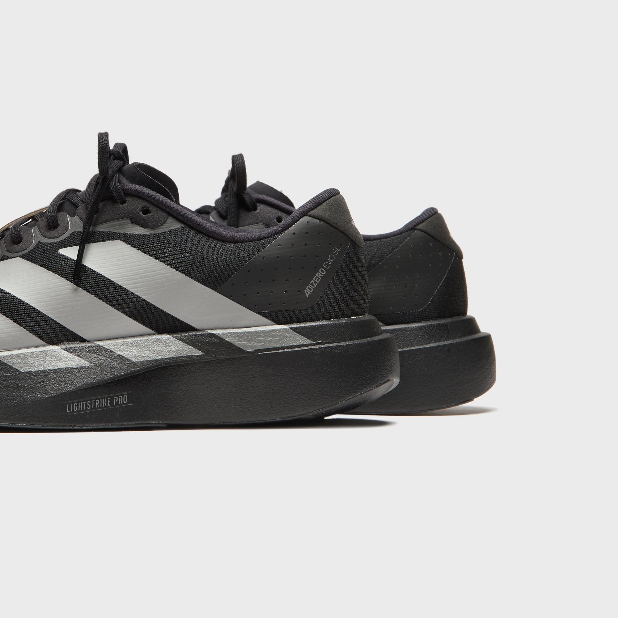 adidas Adizero Evo SL - Core Black / Iron Metallic / Grey Four – Kith