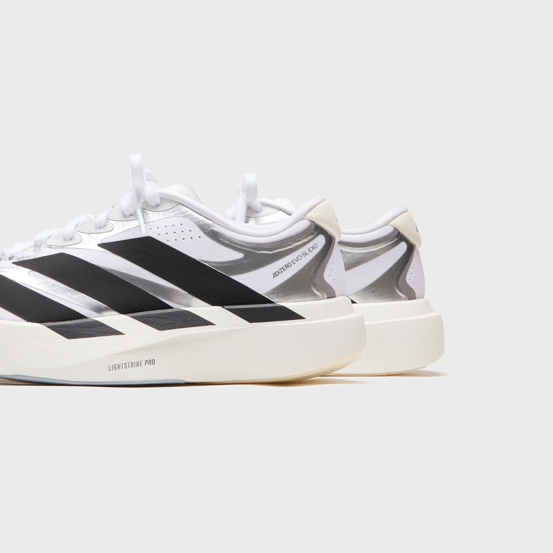 adidas WMNS Adizero EVO SL EXO - Cloud White / Core Black / Iron Metallic