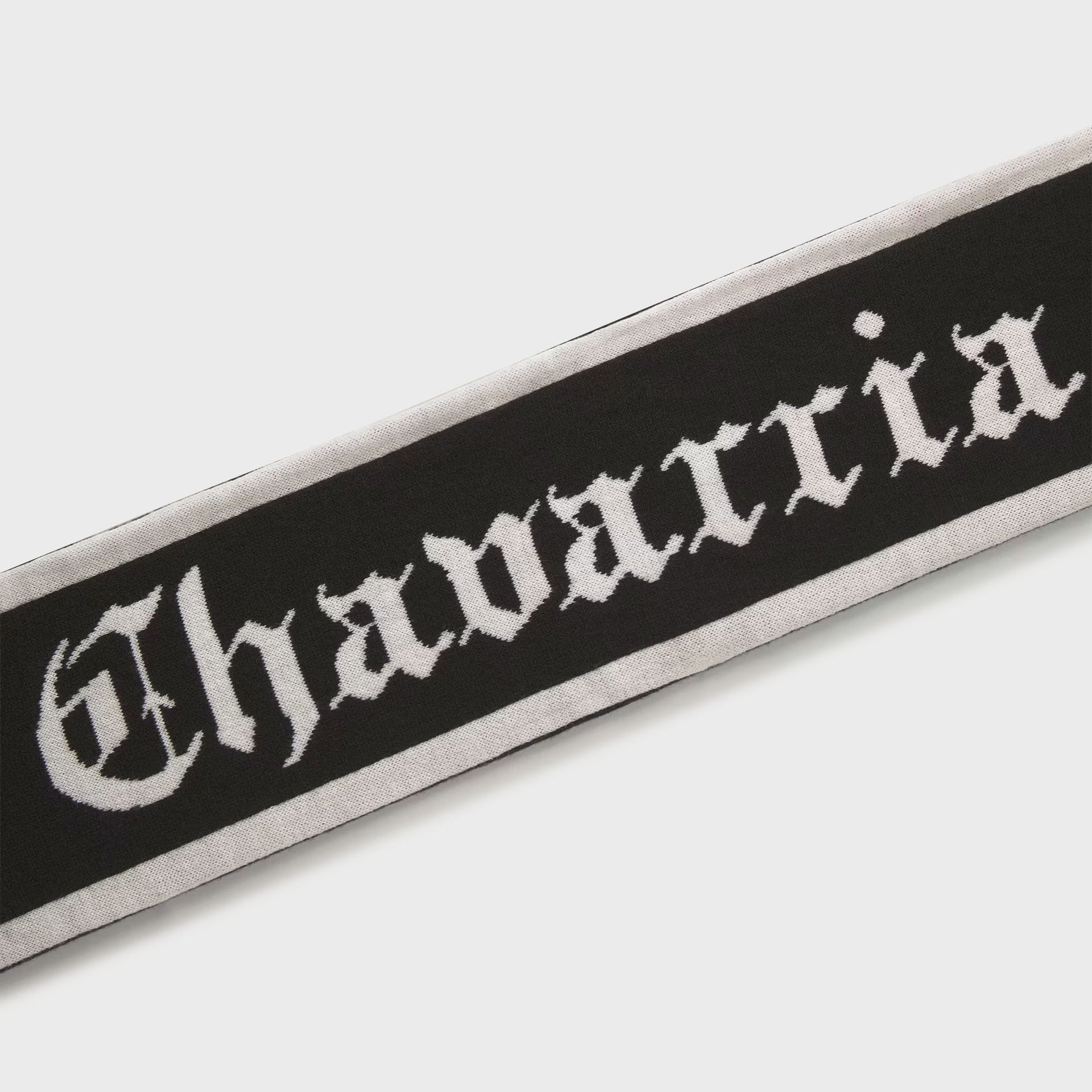 adidas x Willy Chavarria soccer scarf detail, gothic white Chavarria knit lettering on black with cream borders