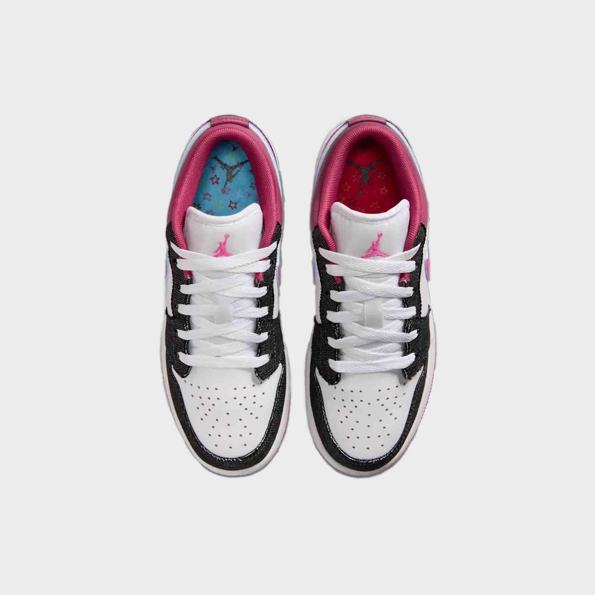 GS Air Jordan 1 Low SE pair from above with mismatched star-print insoles and pink Jumpman tongues
