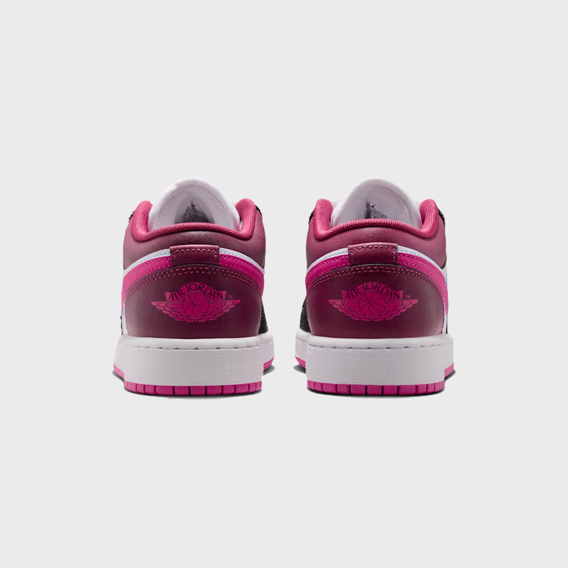 GS Air Jordan 1 Low SE heel view with berry-pink counters and magenta Air Jordan Wings logos