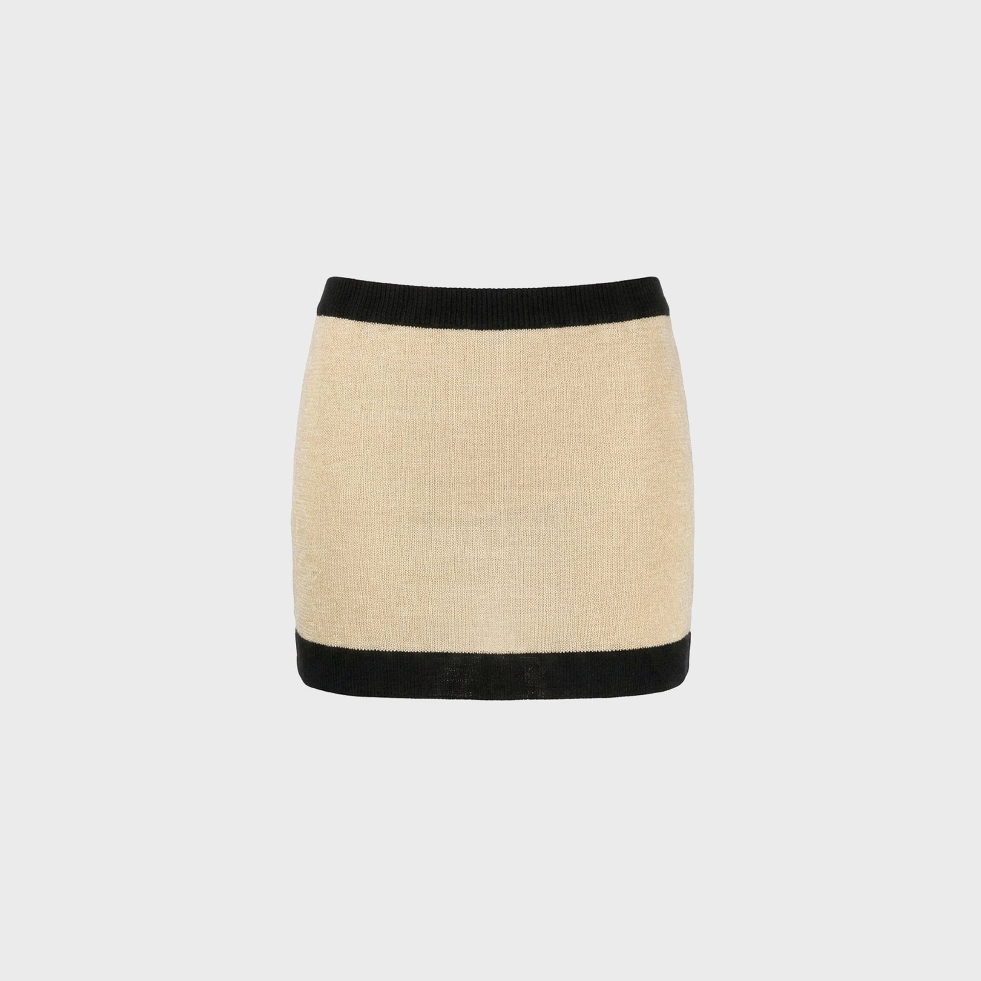 Aya Muse Mirae knit mini skirt in buttercream with black contrast waistband and hem, front flat-lay