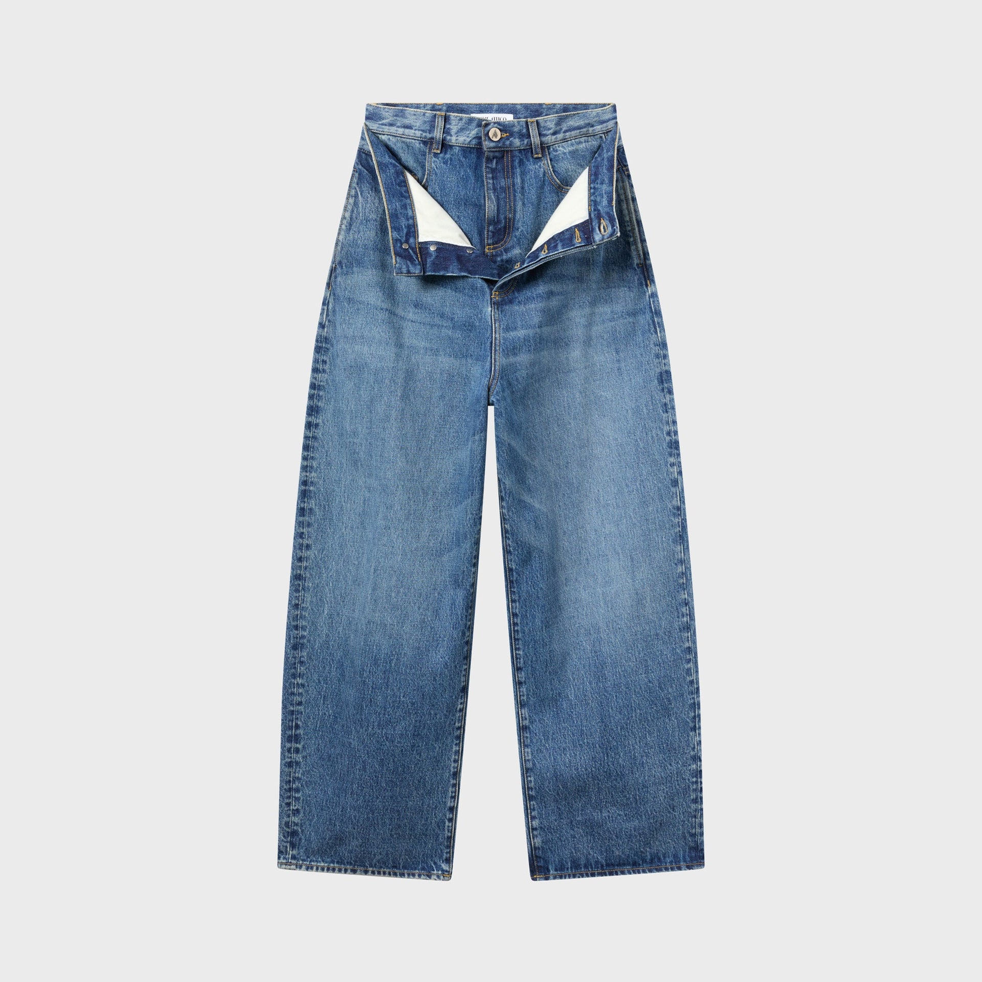 The Attico sky blue baggy jeans, wide-leg with fold-over double waistband detail, light wash, front flat-lay