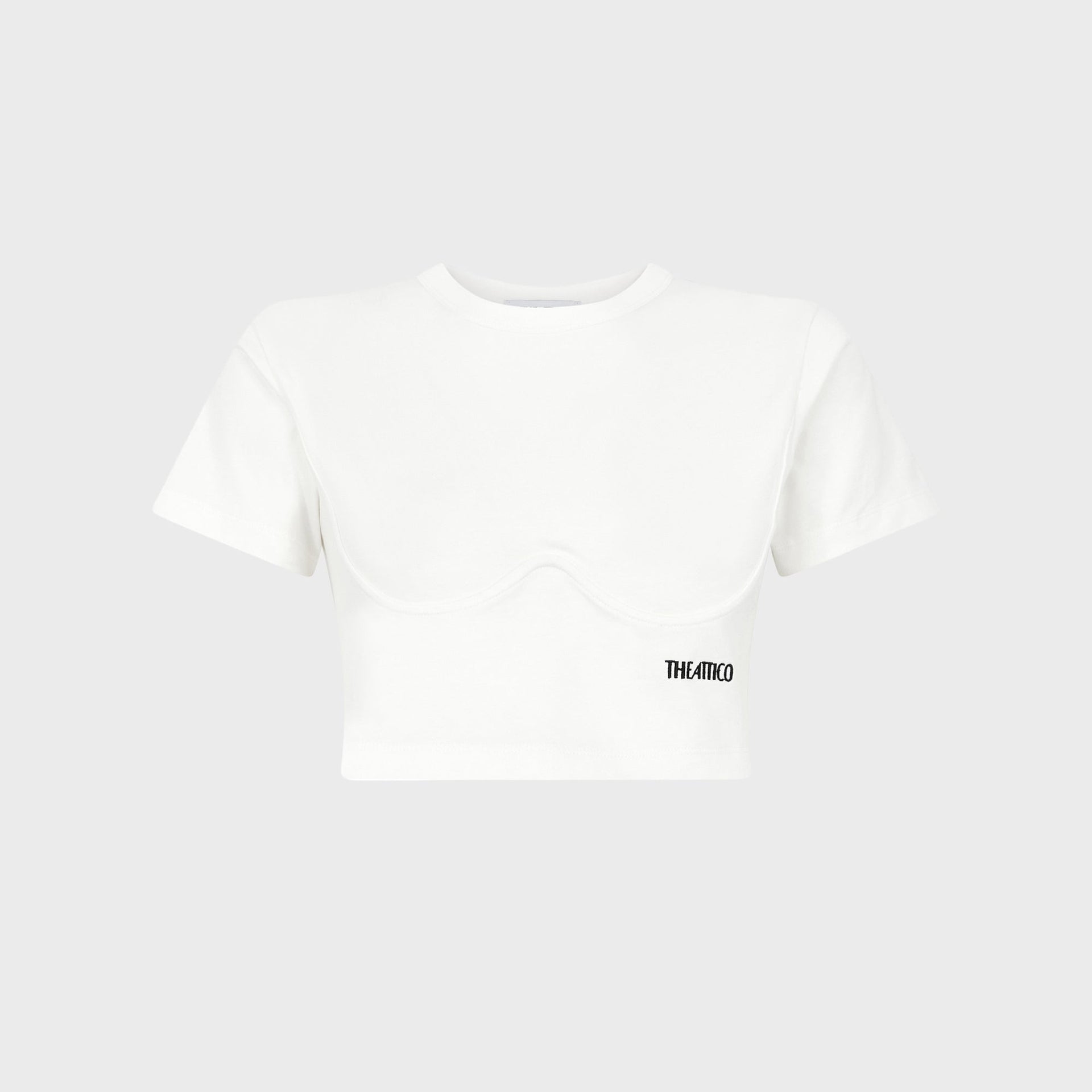 The Attico cropped tee in white, corset-style curved bust seaming, black embroidered logo, front flat-lay