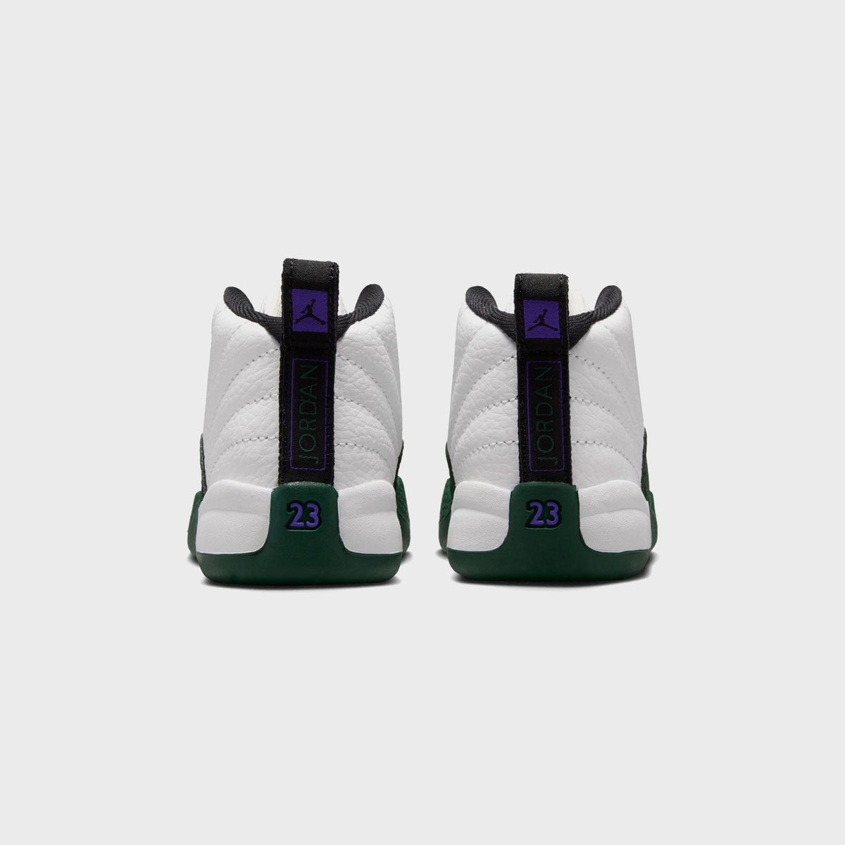Heel view of Jordan TD Air Jordan 12 Retro toddler pair with Jordan wordmark pull tab and purple 23 numbering