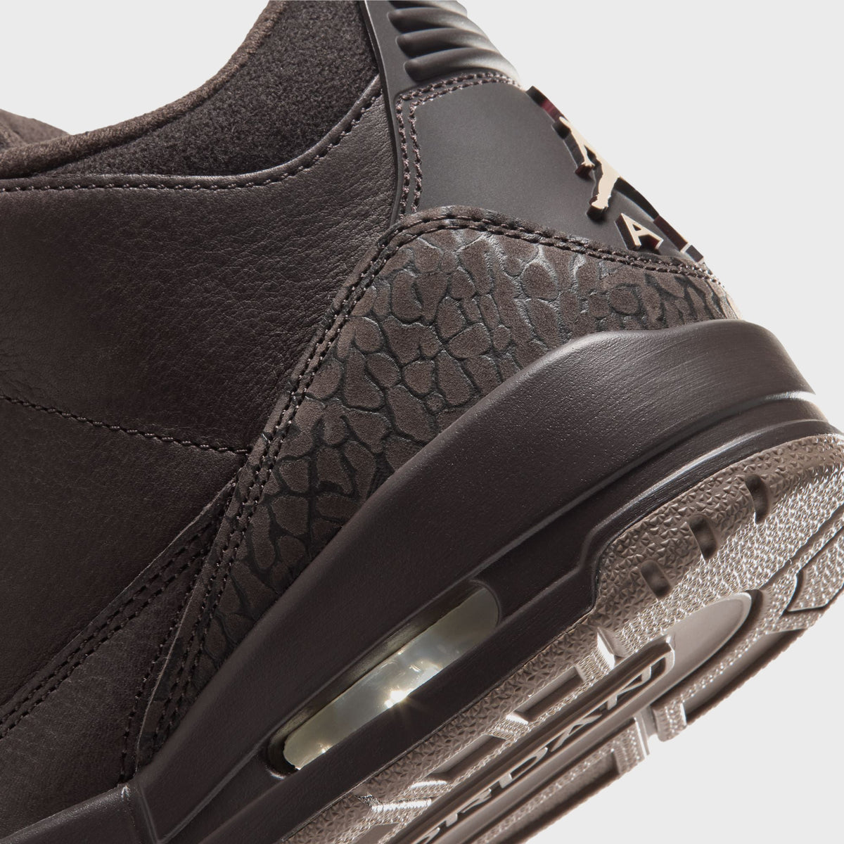Jordan WMNS Air Jordan 3 Velvet Brown close-up of heel with elephant print overlay, visible Air unit and gum-brown outsole