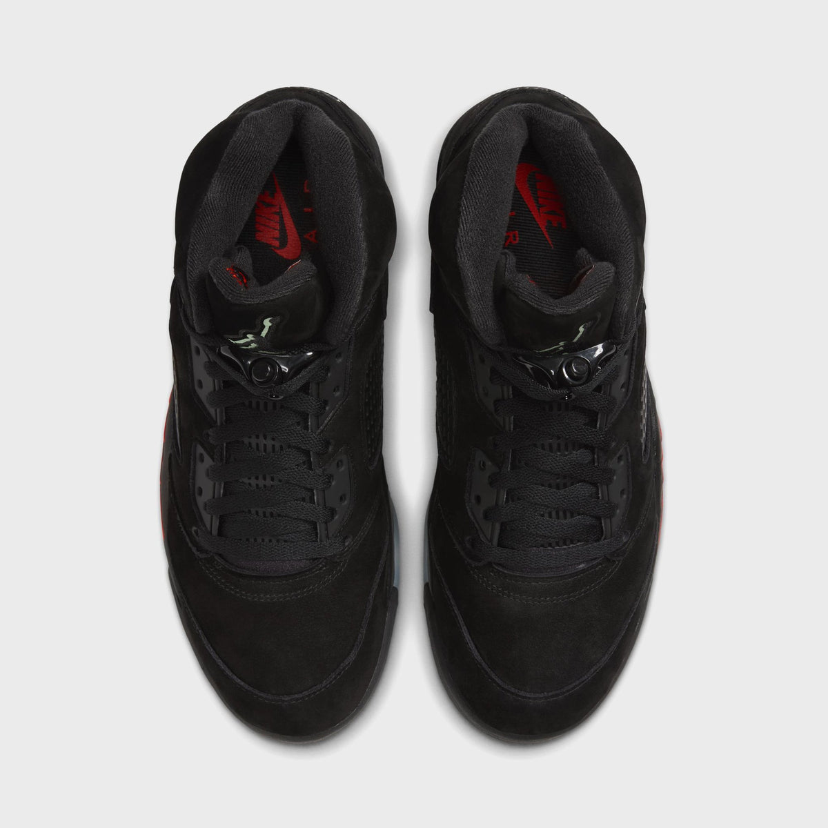 Top-down view of Jordan Air Jordan 5 Retro black suede showing laces, lace lock and red Nike tongue label