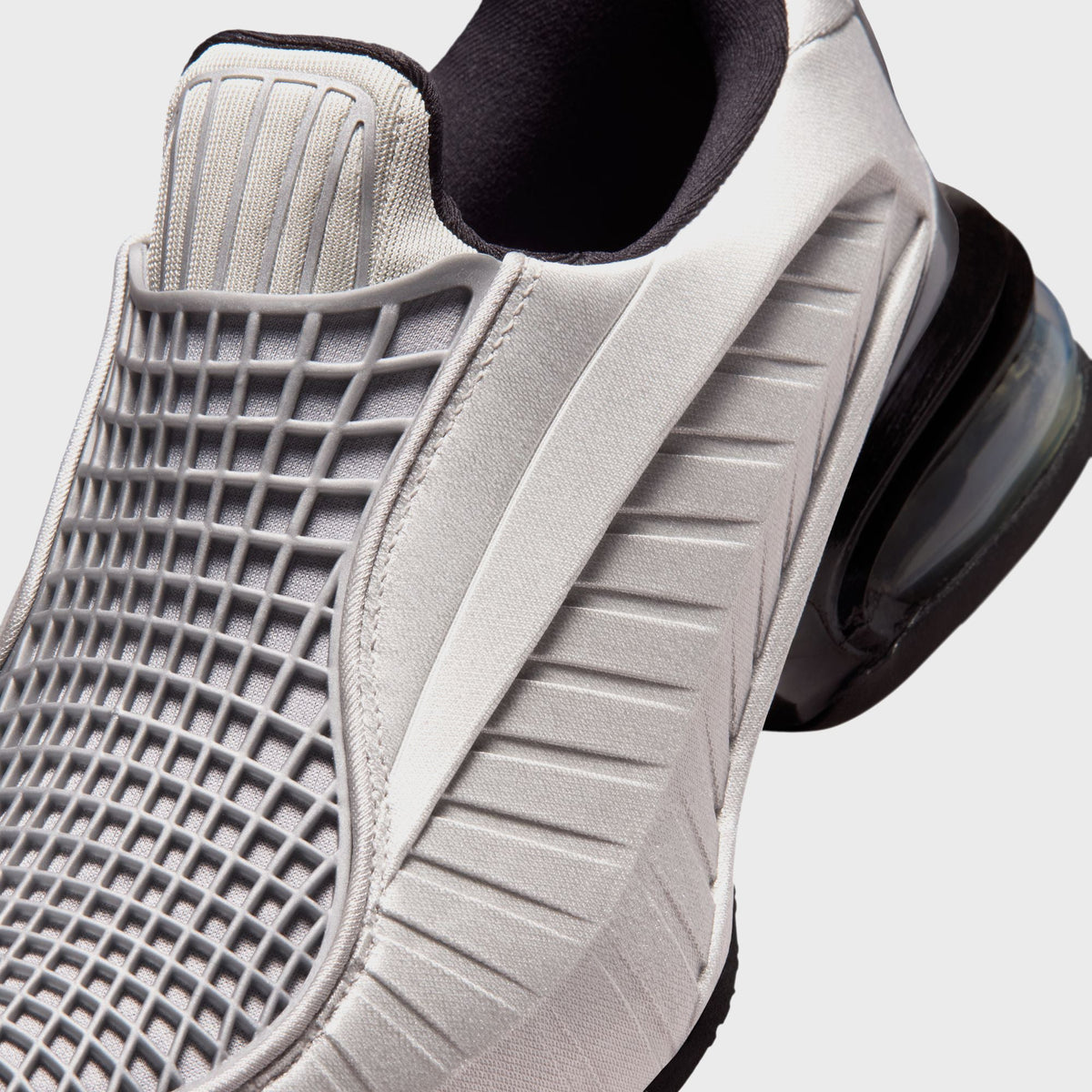 Nike Air Max Dolce sneaker in Metallic Silver, close-up of the ribbed toe box and layered forefoot paneling