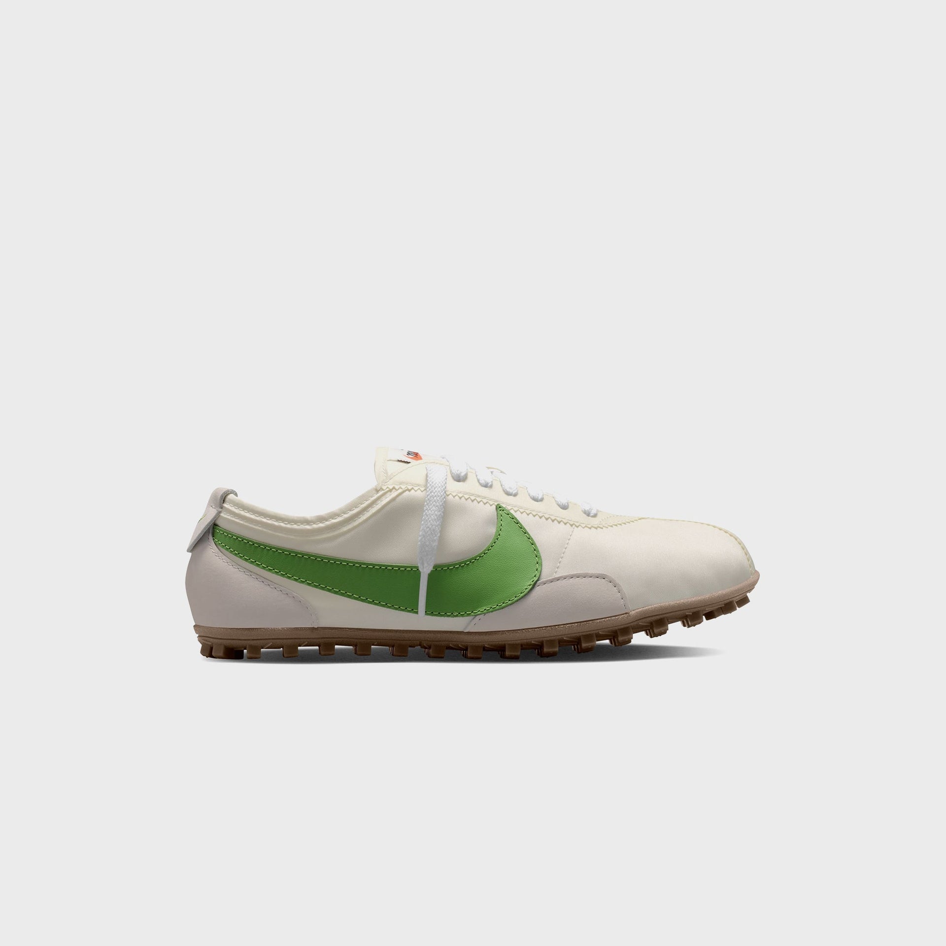 Nike WMNS Moon Shoe in Sail nylon with a green Swoosh and gum waffle outsole, lateral side profile of the right shoe