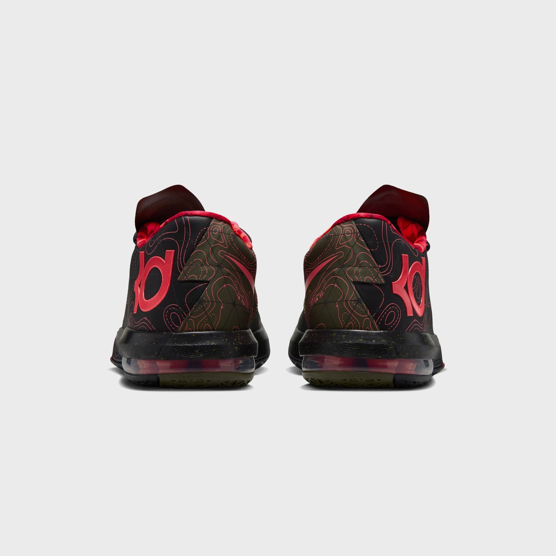 Pair of Nike KD 6 basketball shoes, rear heel view with red KD logo and visible Zoom Air bubble