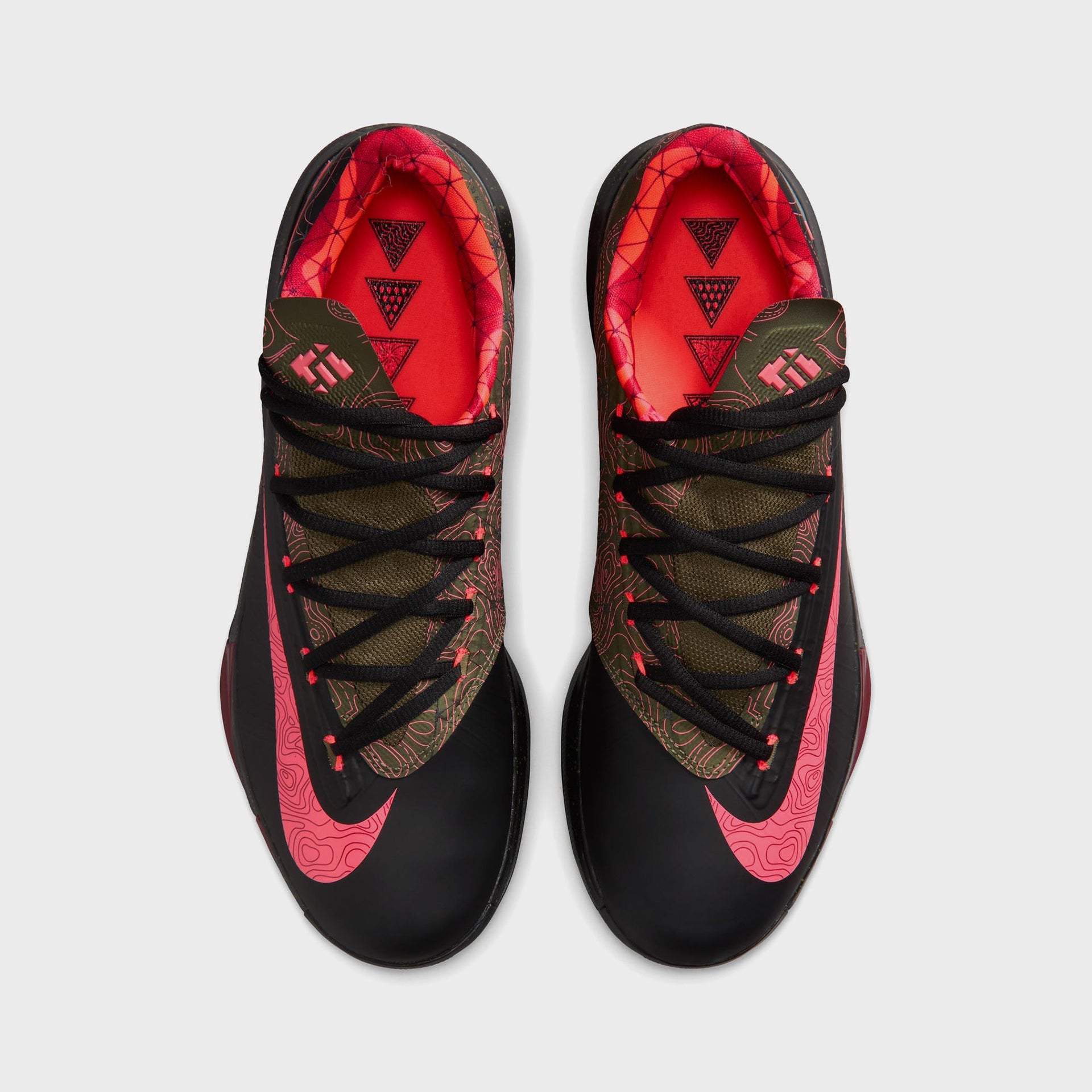 Pair of Nike KD 6 basketball shoes, top-down view showing red interior lining with triangle graphics