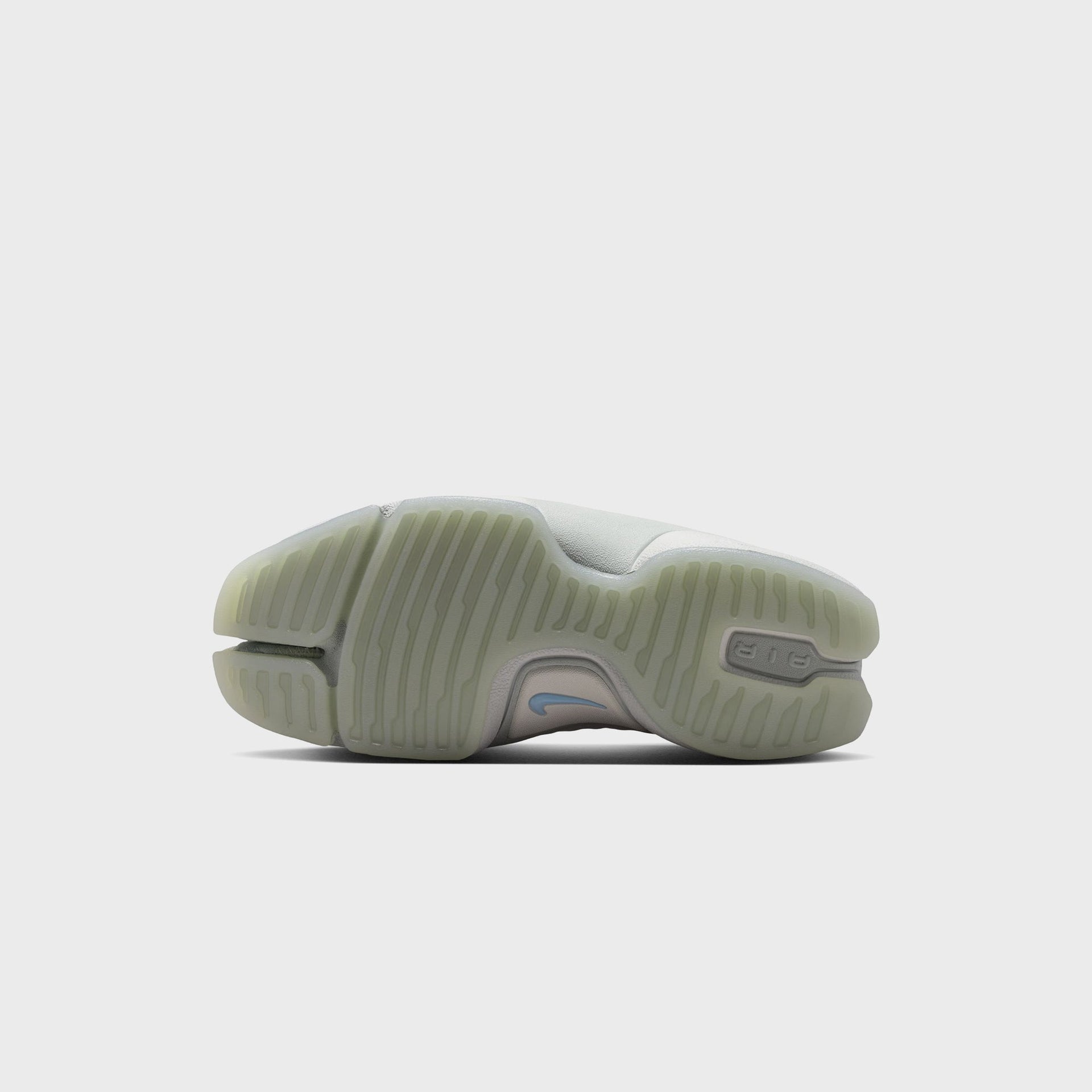 Nike WMNS Rift 2 outsole, translucent sage rubber sole with AIR branding and Swoosh