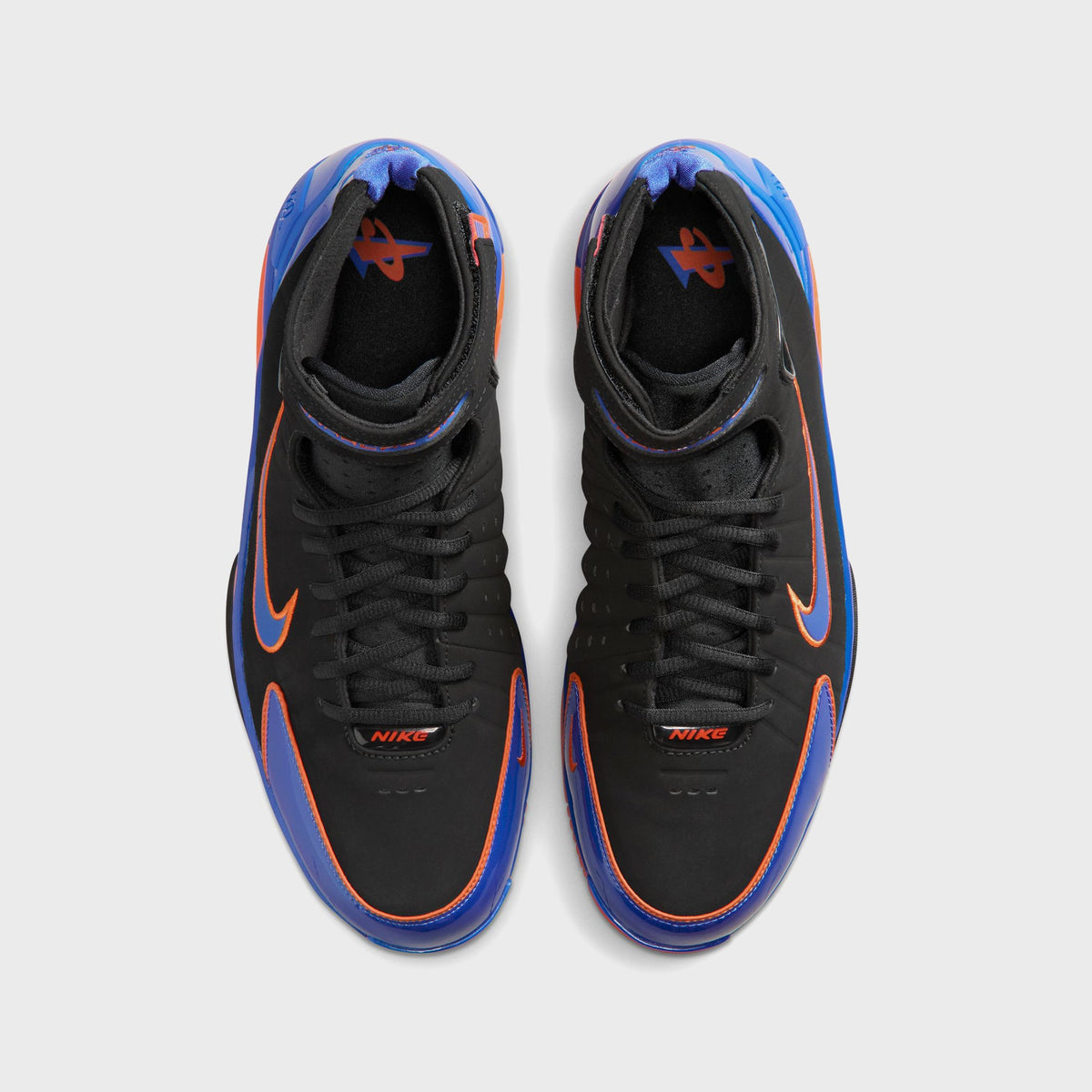 Nike Air Zoom Huarache 2K4 basketball shoes in Black, Varsity Royal, and Safety Orange, top-down view of the high-top pair