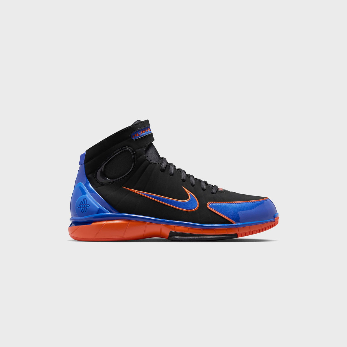 Nike Air Zoom Huarache 2K4 basketball shoe in Black with Varsity Royal and Safety Orange, lateral side view