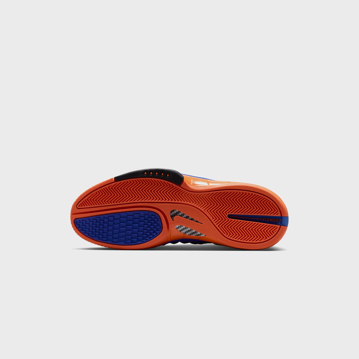 Nike Air Zoom Huarache 2K4 outsole in Safety Orange and Varsity Royal, close-up of the herringbone traction pattern