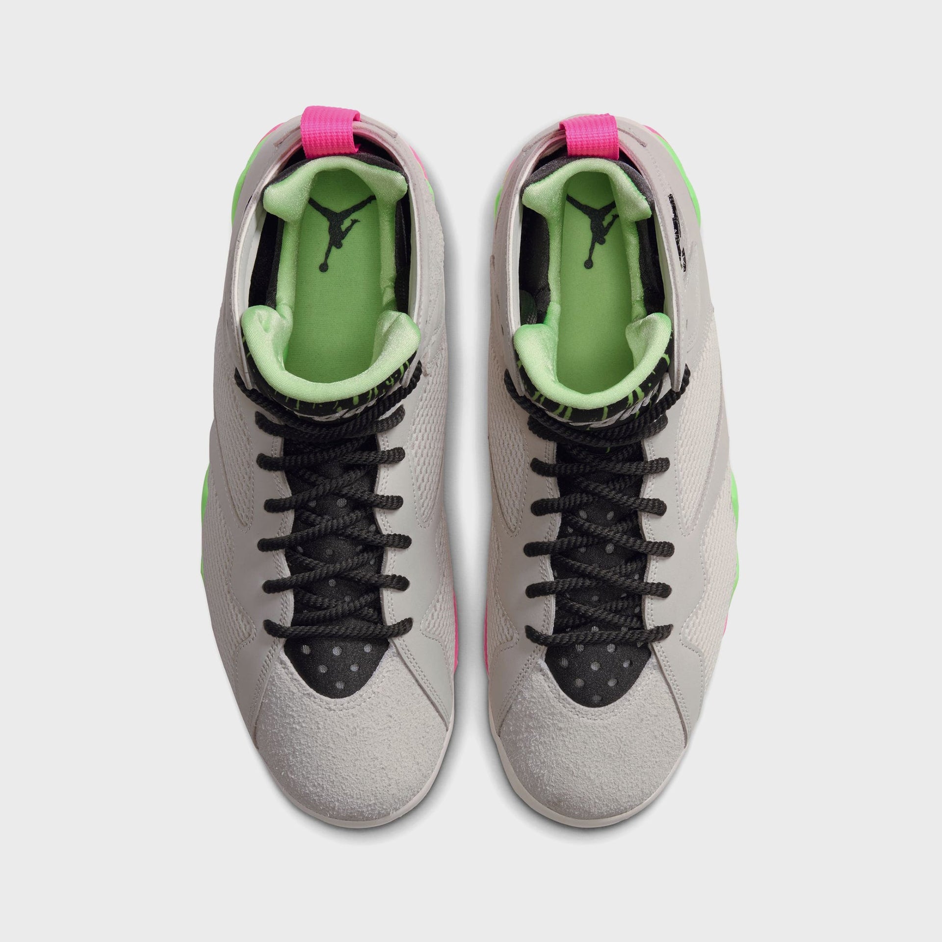 Top-down view of Air Jordan 7 Phantom Lime Blast sneakers showing green interior lining