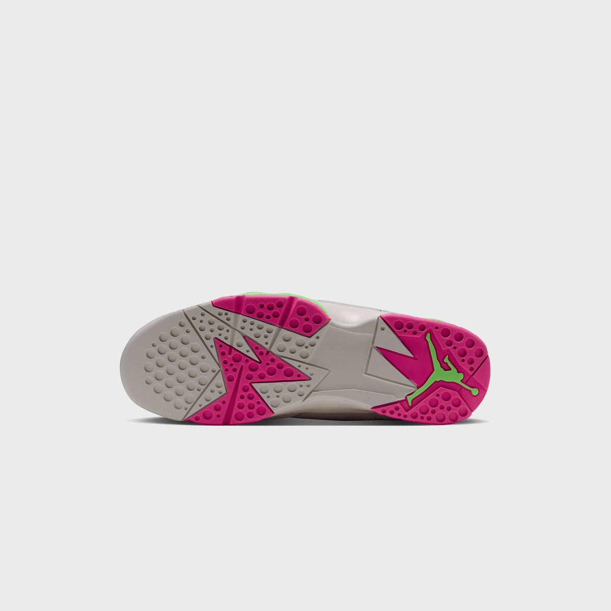 Bottom sole view of Air Jordan 7 Phantom Lime Blast showing pink and green outsole pattern