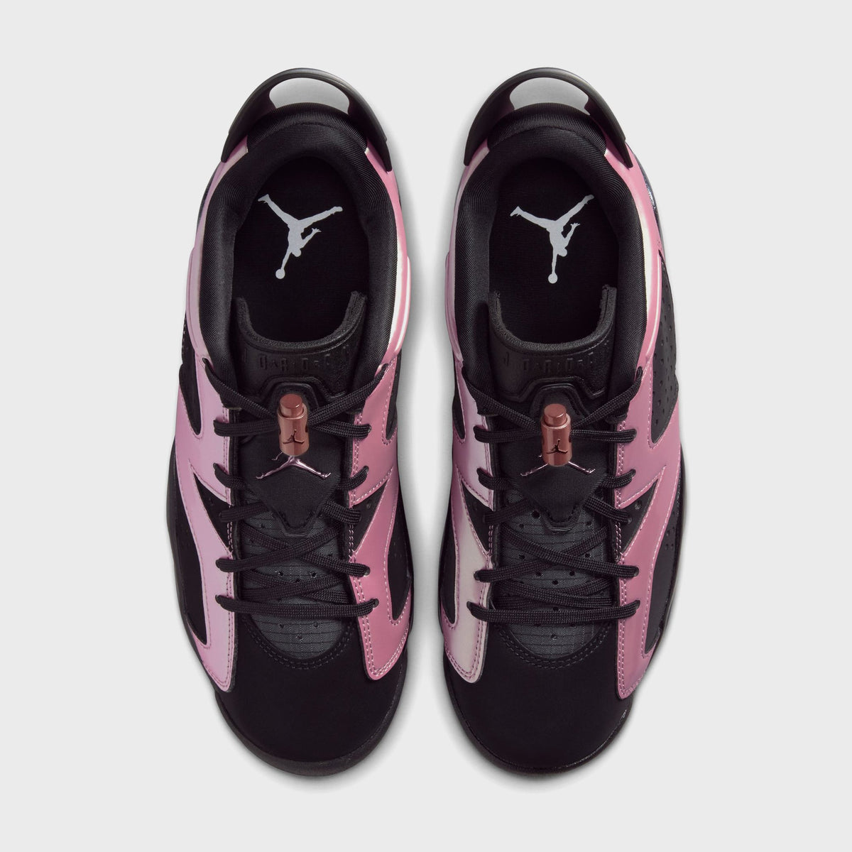 Jordan WMNS Air Jordan 6 Low in Black / Desert Berry, top-down view of the black and pink sneaker pair