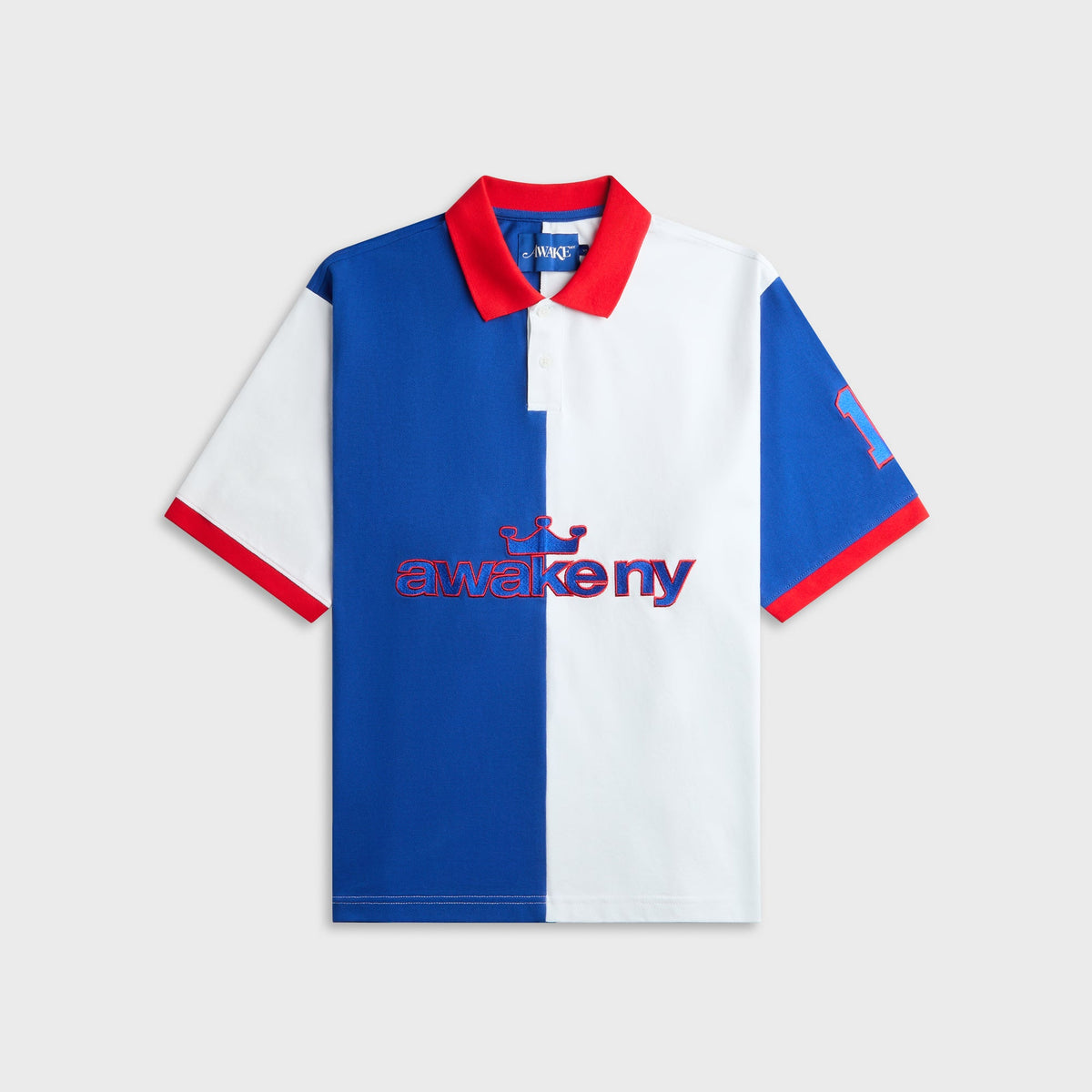 Awake NY Crown Polo in Blue, color-block blue and white polo with red trim, front view
