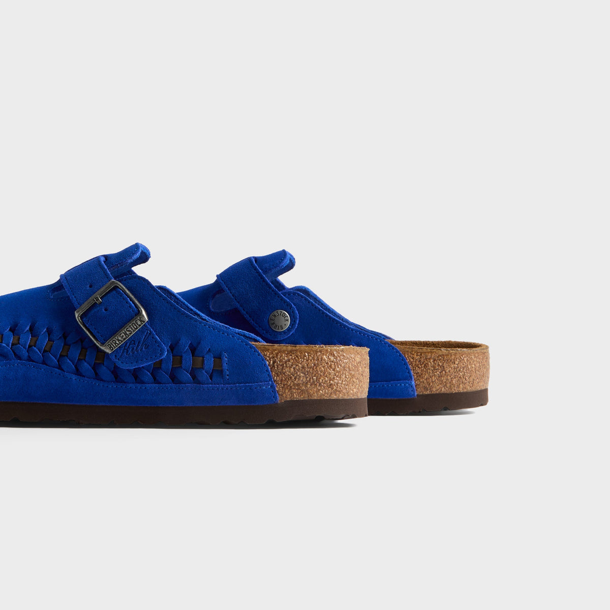 Kith for Birkenstock Boston Braided in Ultra Blue, close-up of the pair's cork footbeds and heels with buckle straps