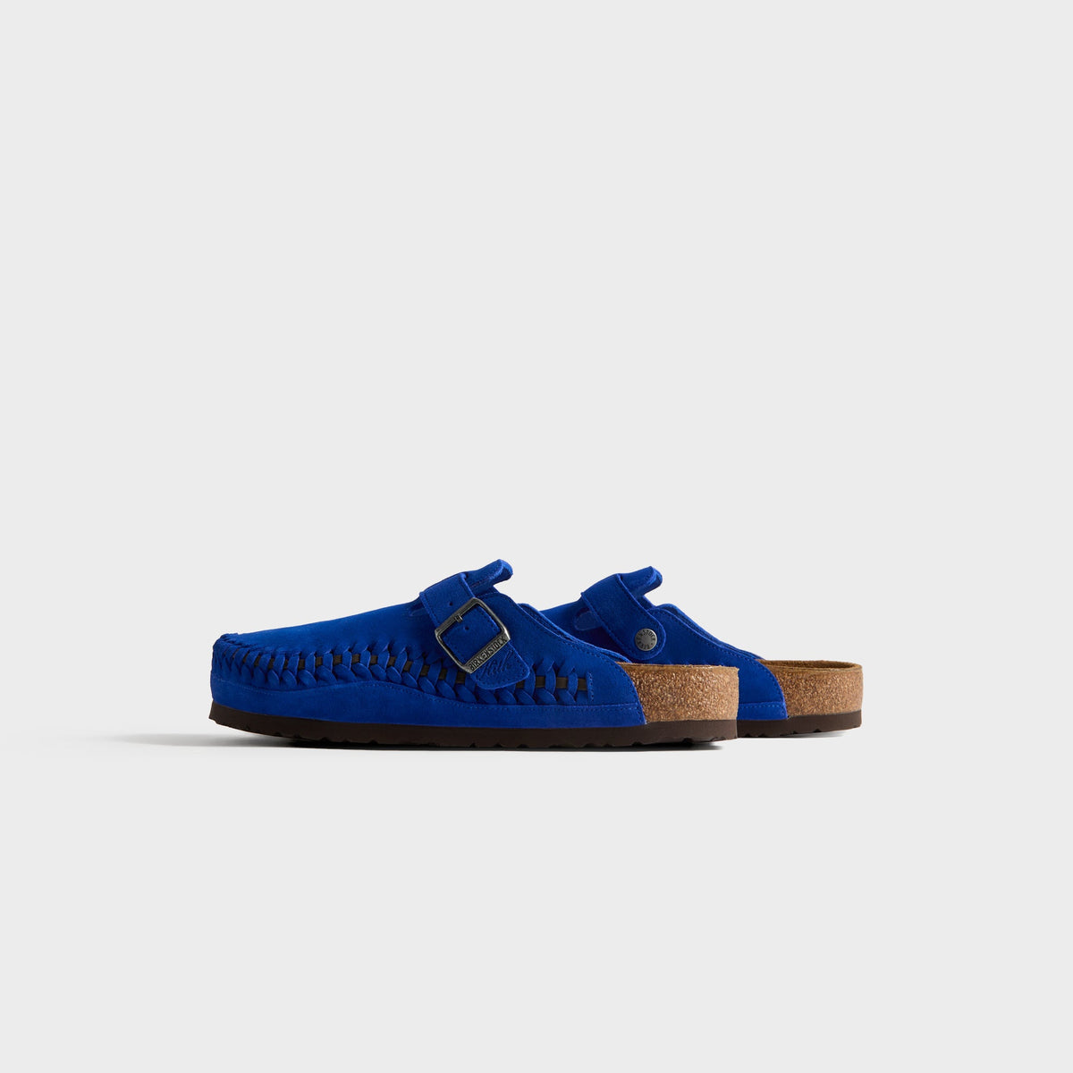 Kith for Birkenstock Boston Braided in Ultra Blue, rear three-quarter view of the open-back cobalt suede clog pair