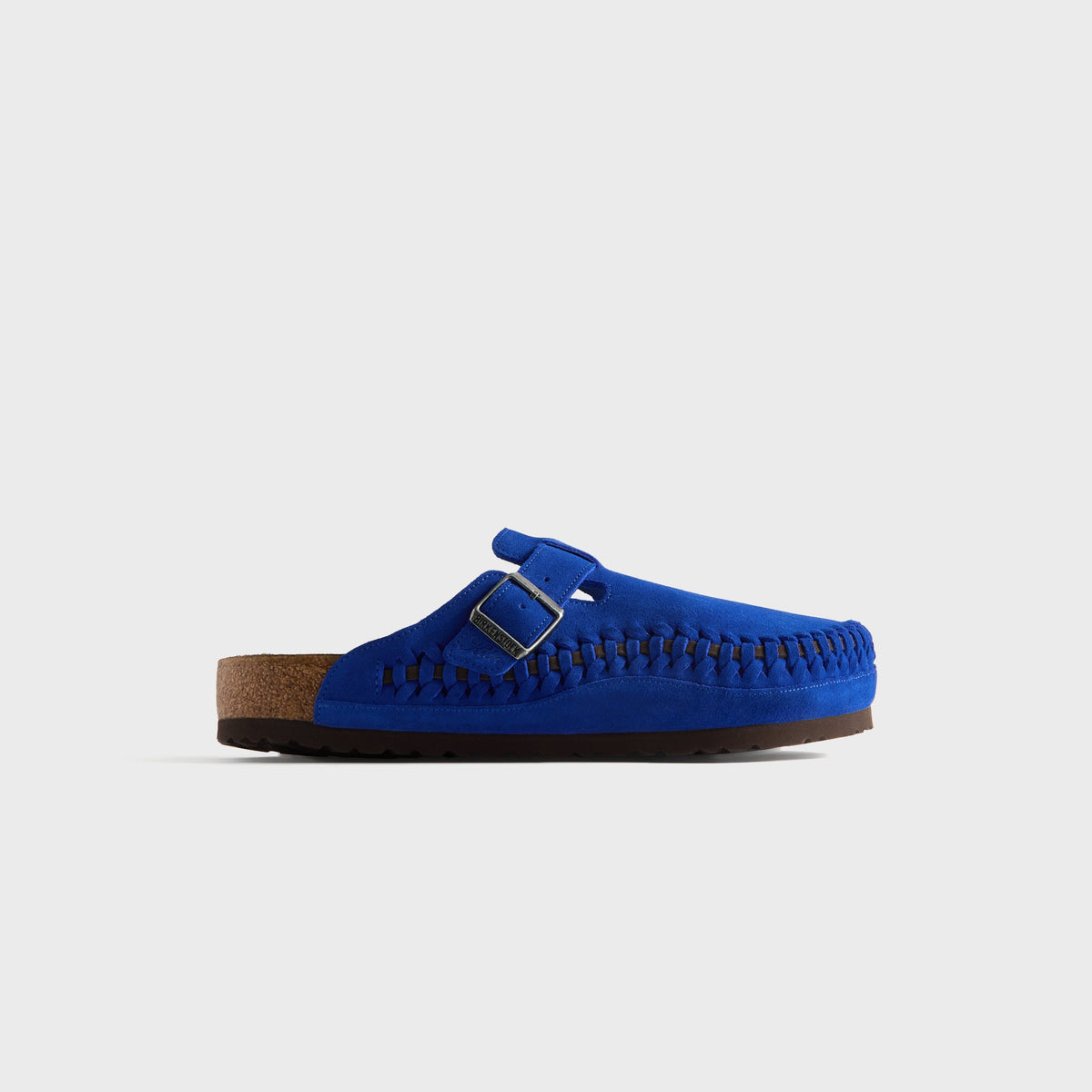 Kith for Birkenstock Boston Braided clog in Ultra Blue, lateral profile of the right cobalt suede mule with buckle and cork footbed